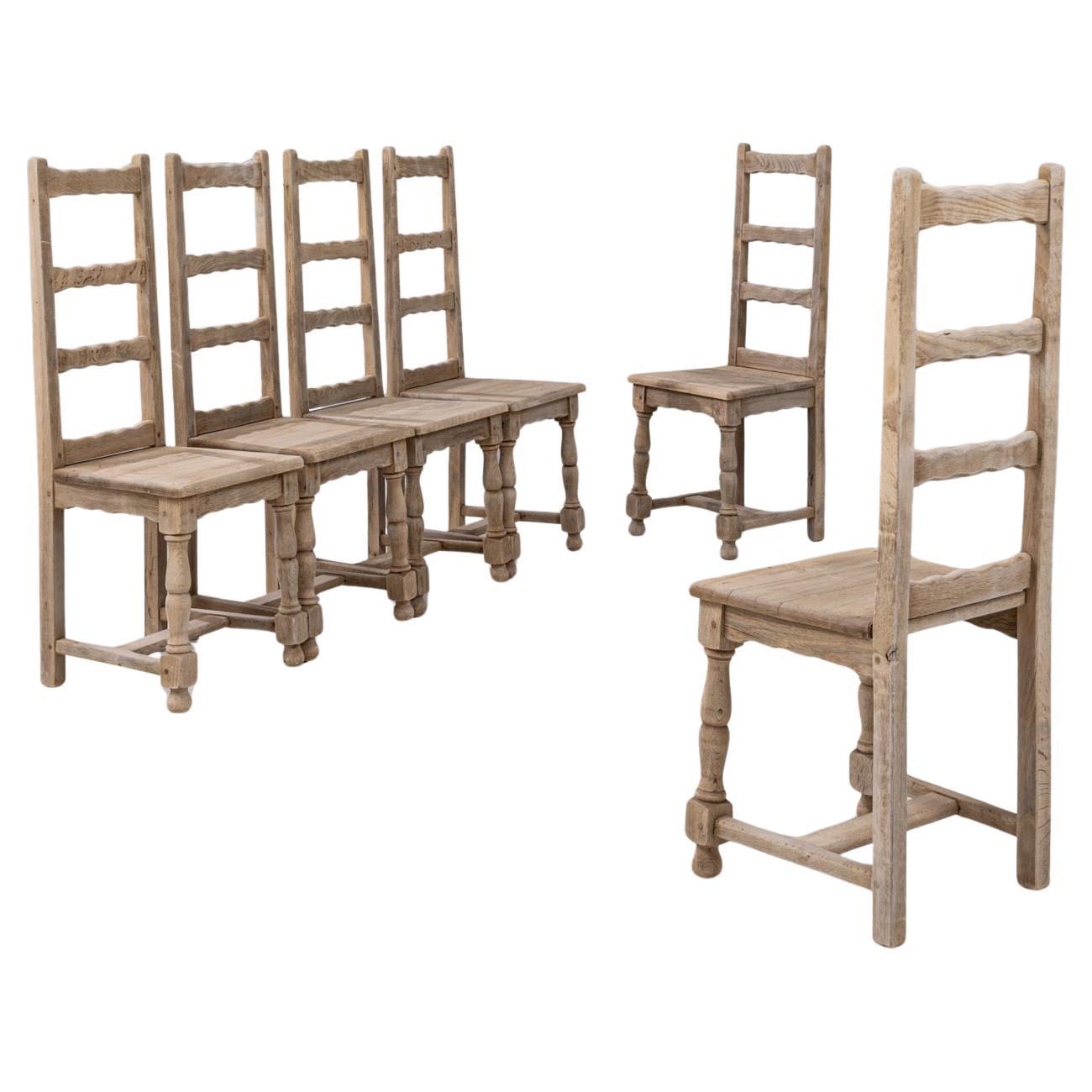 Ensemble de six chaises de salle à manger en chêne à dossier en échelle, du 20e siècle, de style français