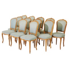 Antique 20th Century French Set of Twelve Louis XV Style Polished Walnut Dining Chairs