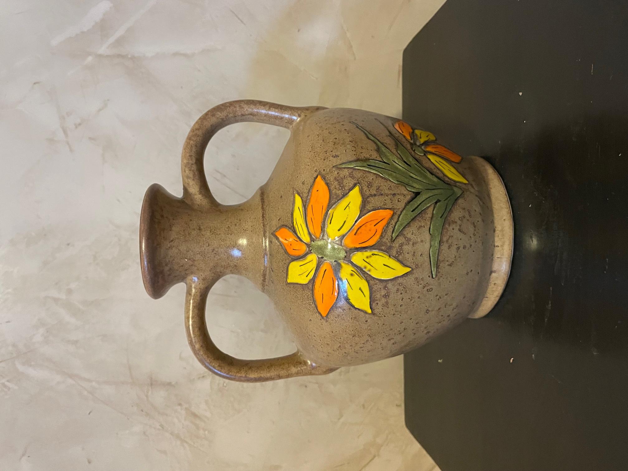 Very nice 20th century French ceramic jar, can be used as a vase. 
Made in the 1980s. 
Flower decoration on the vase. Signed under the base 