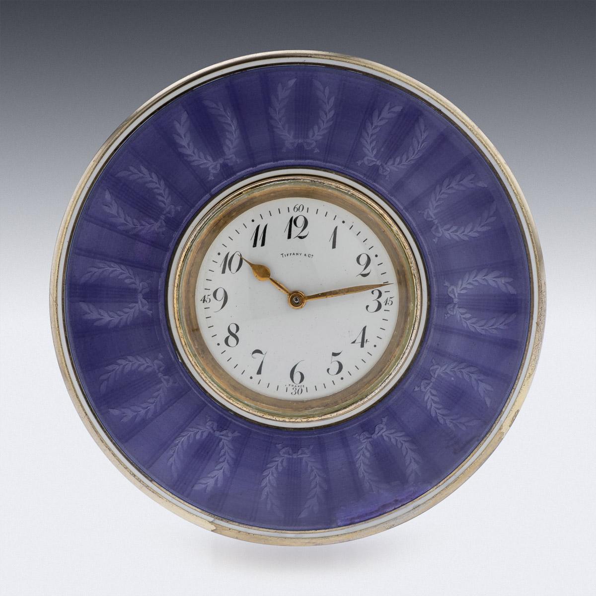 20th Century French silver & vibrant purple guilloche enamel table box with a clock. Richly silver-gilt and with an 8 day clock insert, with a white dial, numbers and subsidiary second dial. The clock in working condition. Hallmarked French silver