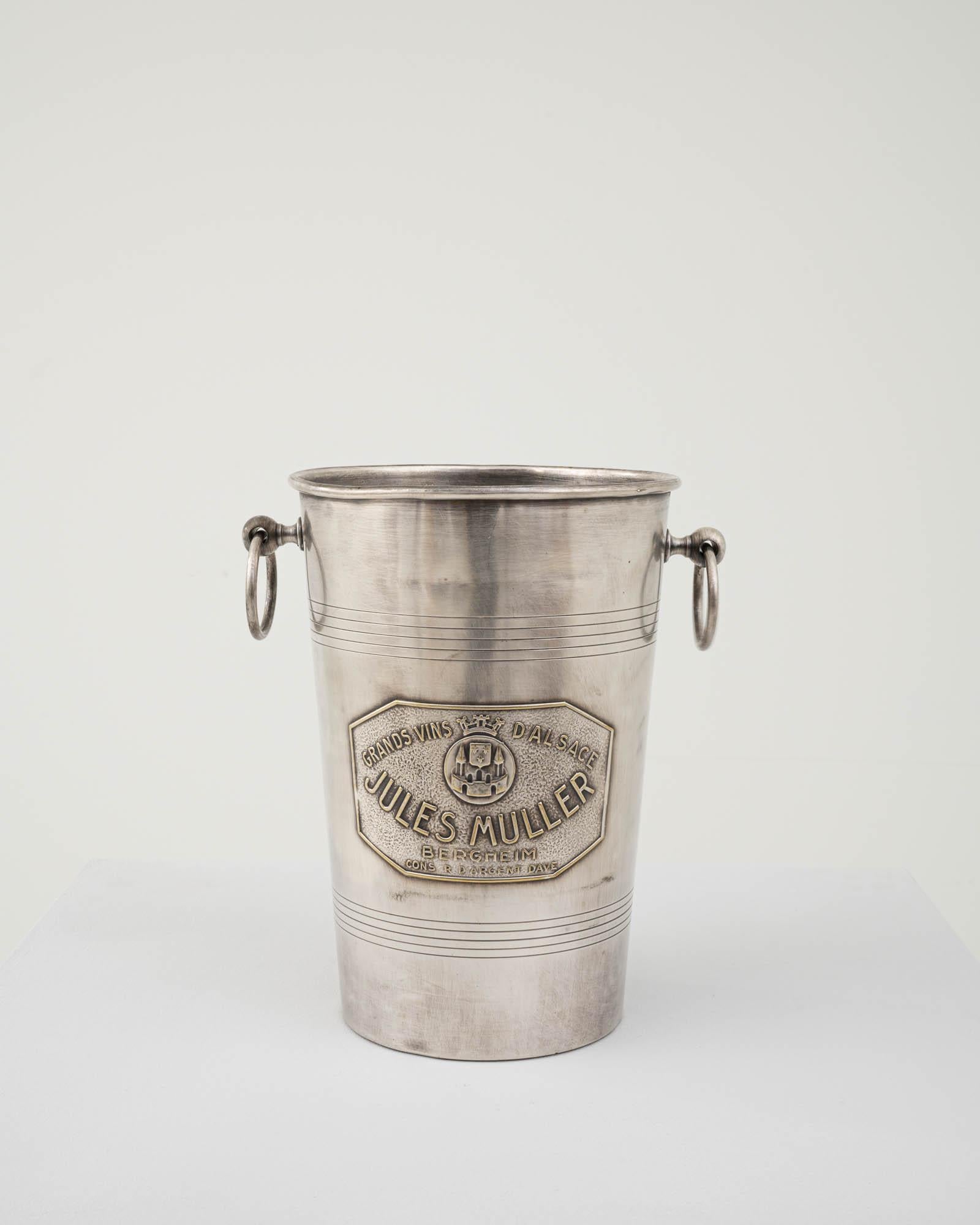 This vintage ice bucket evokes the glamorous parties of yesteryear. From before the era of refrigeration, this was an essential appliance for every party or quiet evening refreshment. Made in France in the 20th century, this bucket was likely used