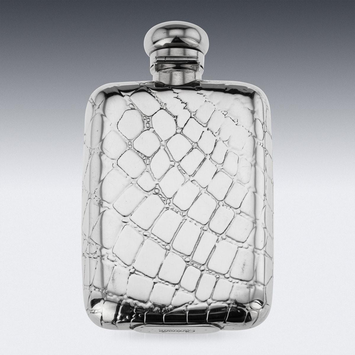 A superb 20th Century solid silver hip flask with silver hinged top. This flask has an outer design of a crocodile skin. Hallmarked sterling silver (925 standard), Paris, circa 1980, Makers mark Christofle.

CONDITION
In Great condition - No damage,
