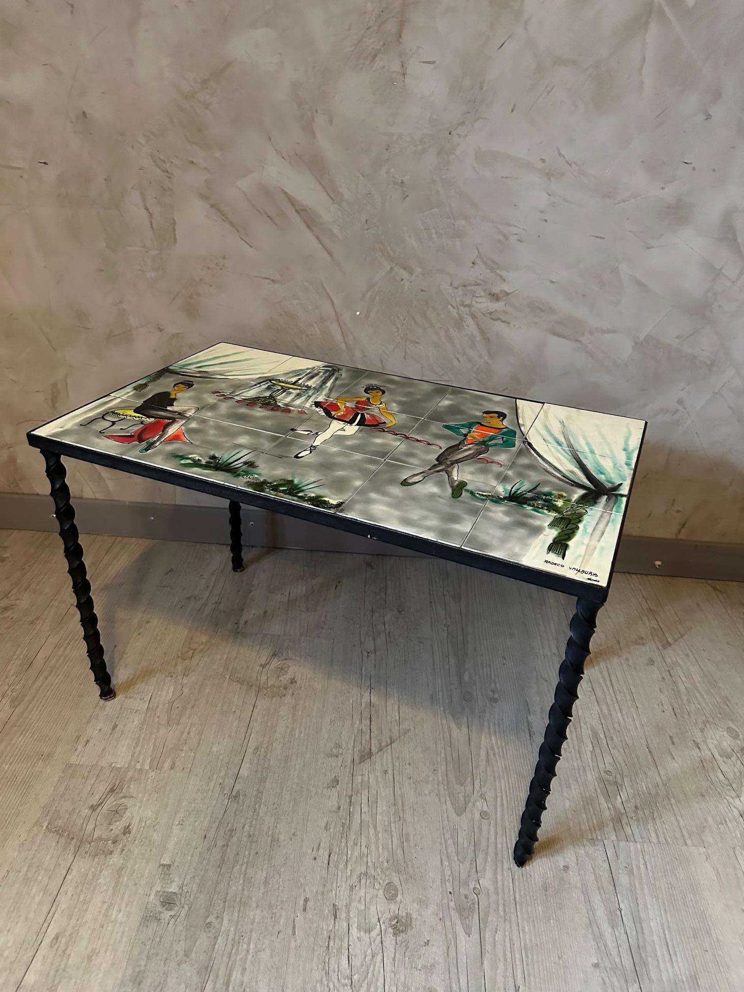 Very nice Coffee table from the 60s in metal and Vallauris ceramic top representing broom dancers. 
Signature on the tray 