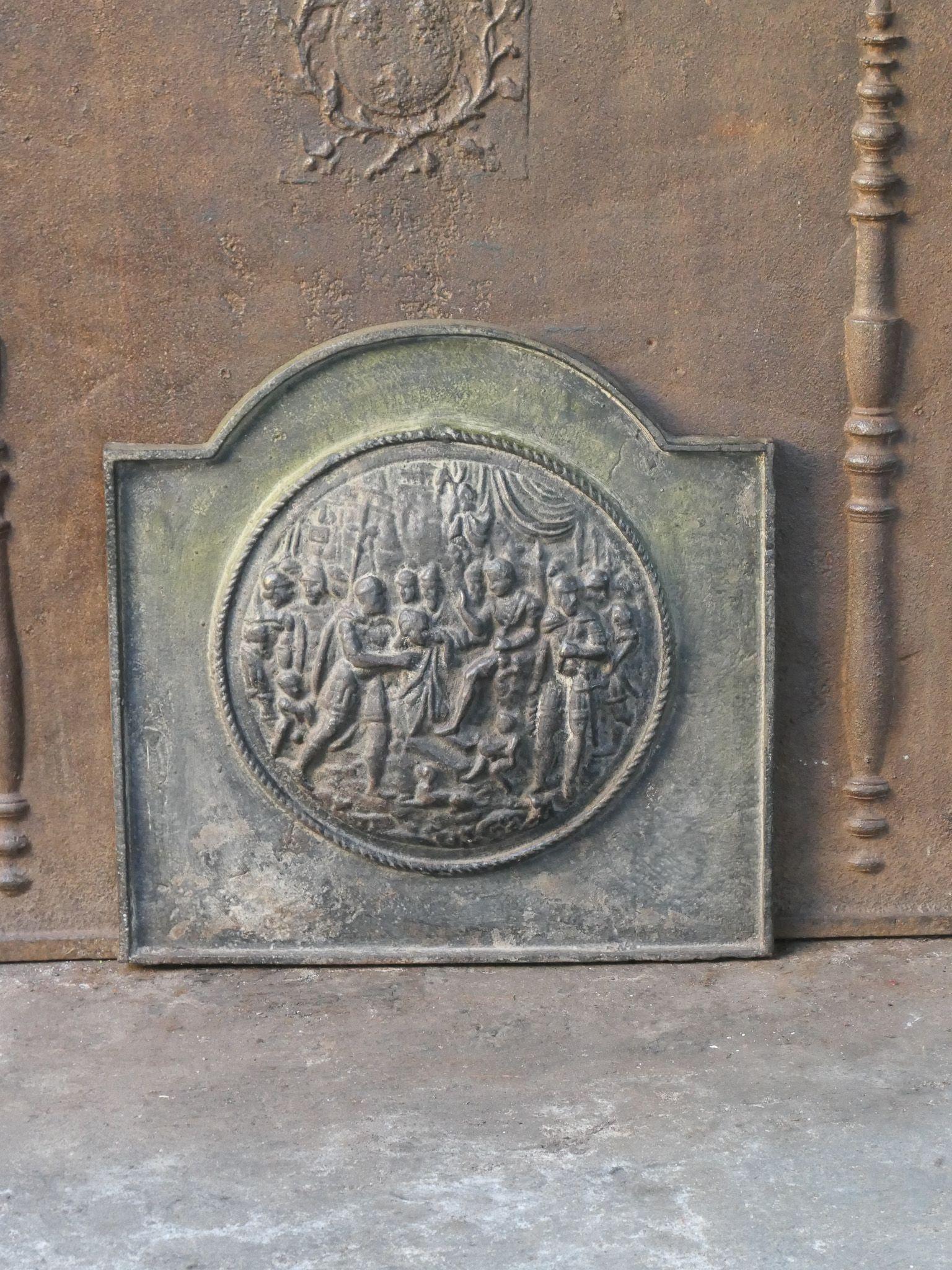 20th century French Victorian style fireback with a religious theme. 

Made of cast iron, the fireback has a natural brown patina. Upon request, it can be made black / pewter at no extra cost.