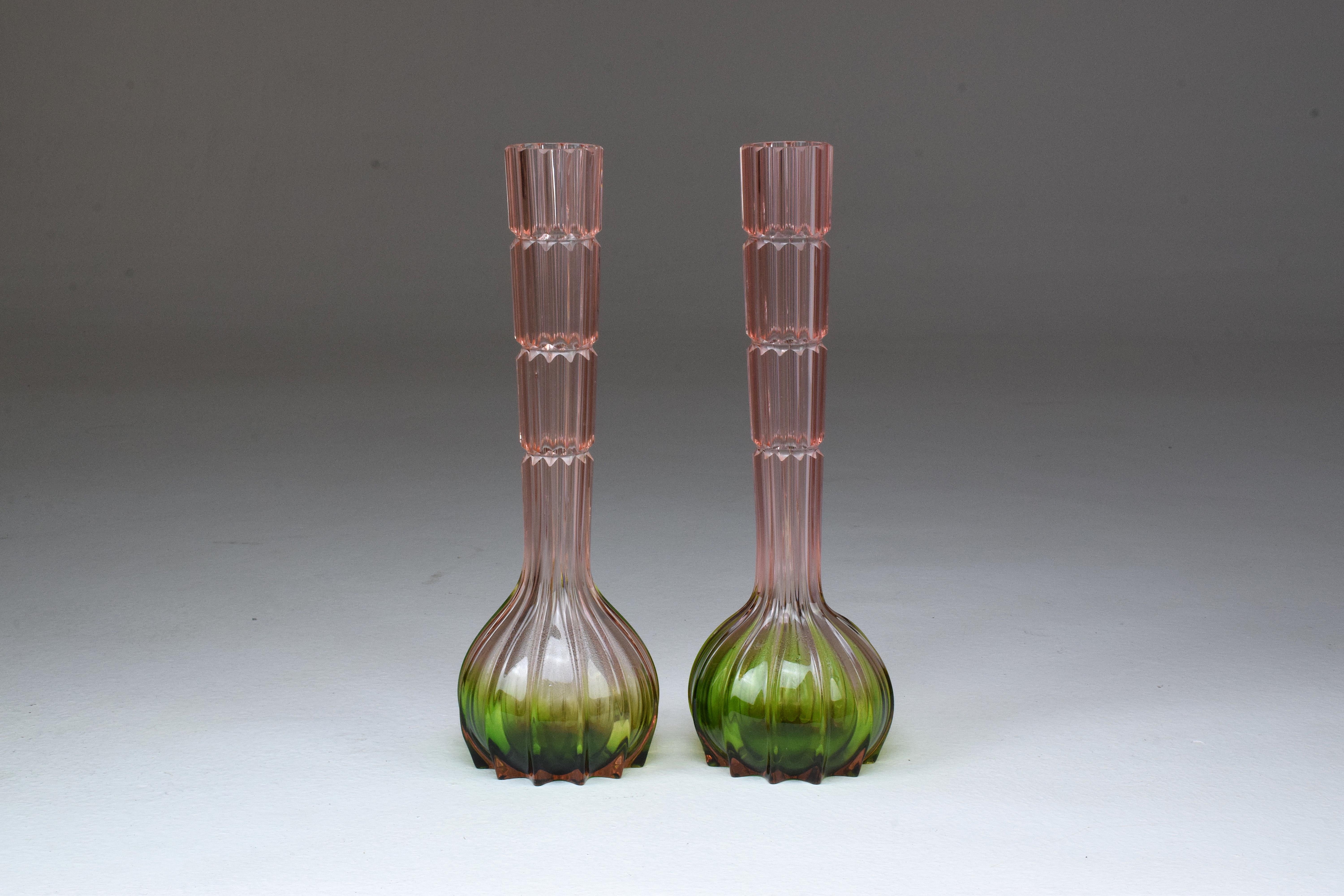French midcentury art glass flower vases designed in hues of pink and green. Beautifully embellished.
Available as a set or as a unit.
France, 1960s.