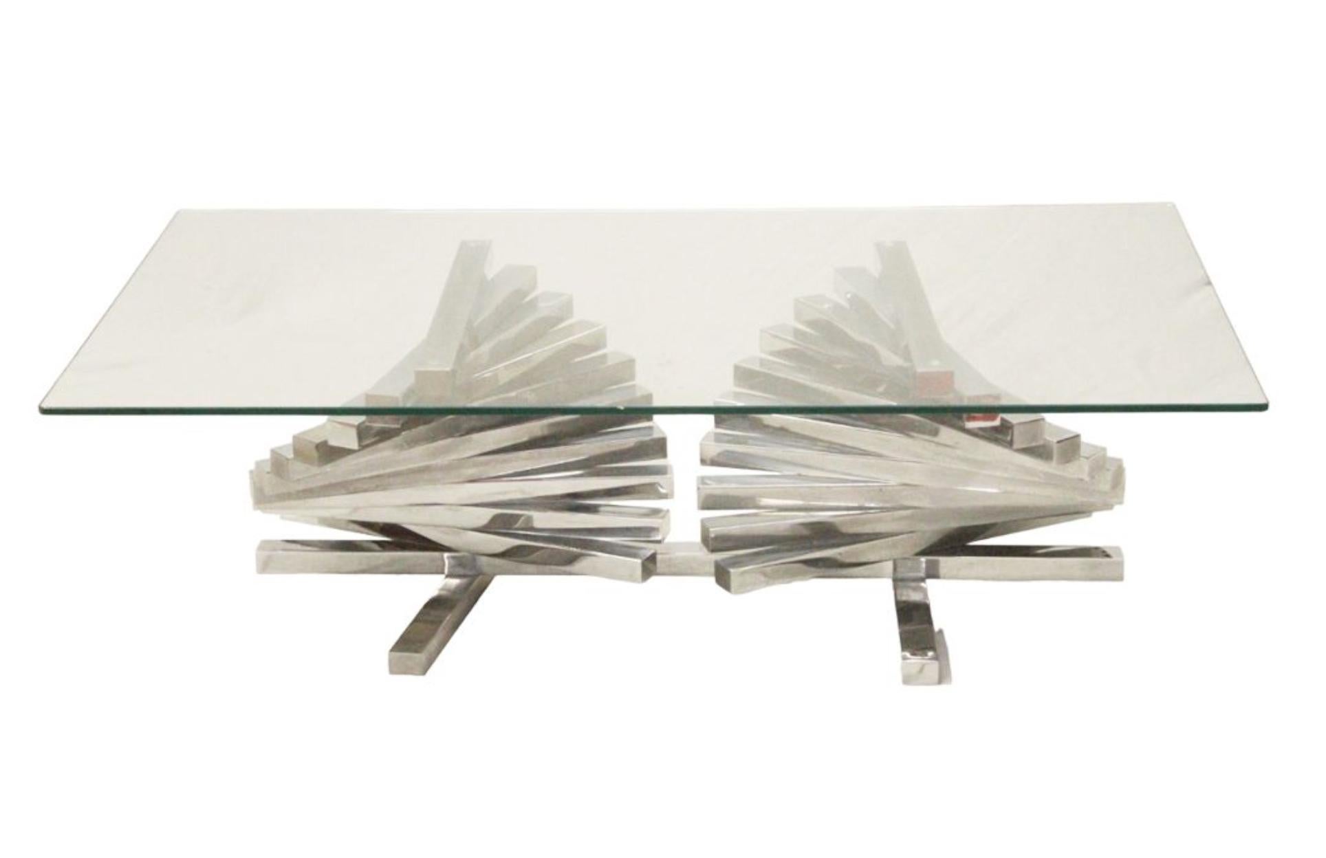 Vintage French sofa table made in chrome with heavy glass top attributed to Romeo Rega in mid 20th century. Good overall condition with no restorations ever made.
France, circa 1970

