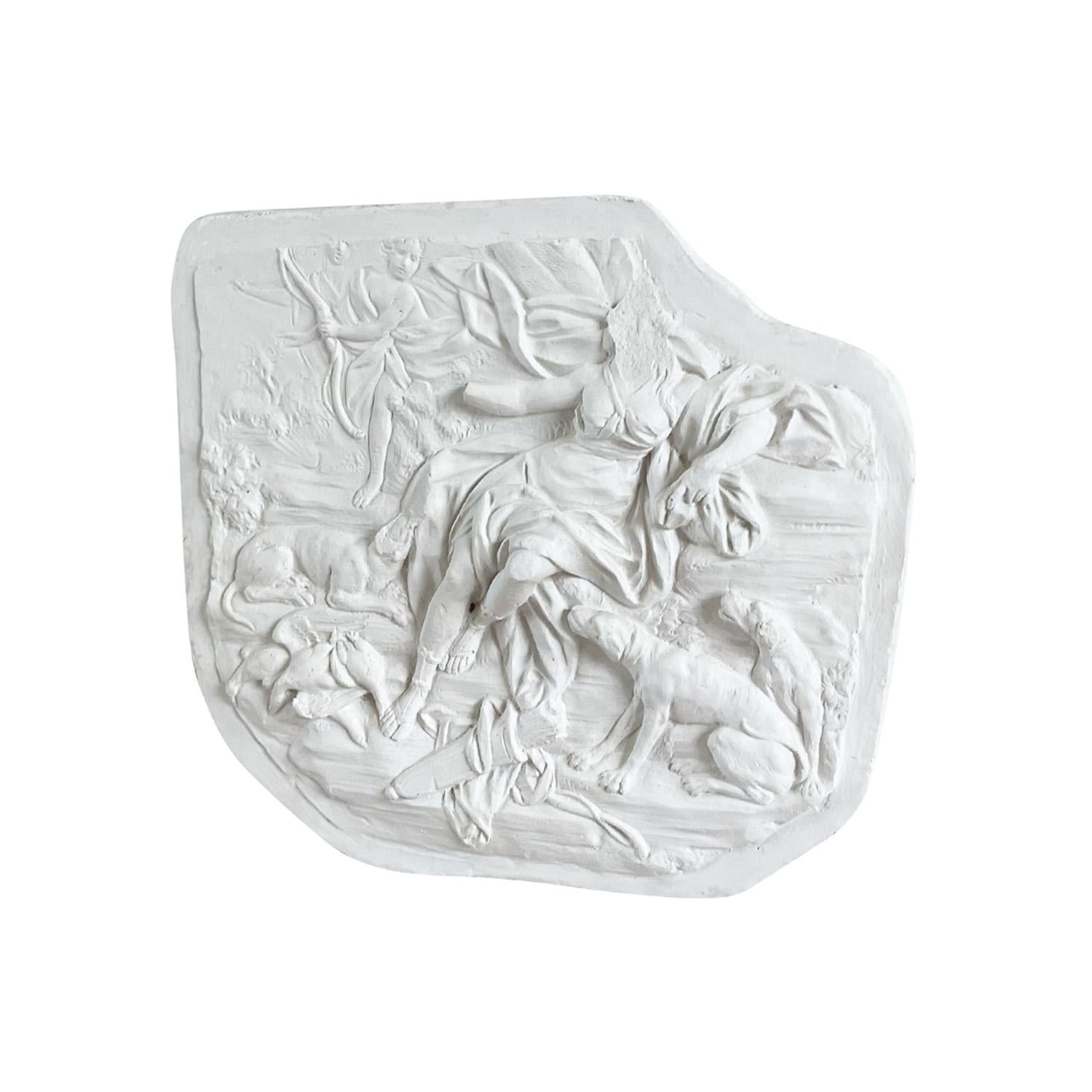 A vintage wall relief or panel depicting Artemis molded in French Plaster, in good condition. Not recommended for exterior use. Minor fading, due to age. Wear consistent with age and use. Circa 1960 - 1980, France.

Artemis was the goddess of hunt,
