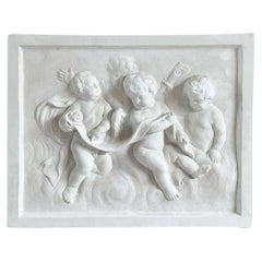 Relief mural vintage français du 20ème siècle représentant quatre Cherubim