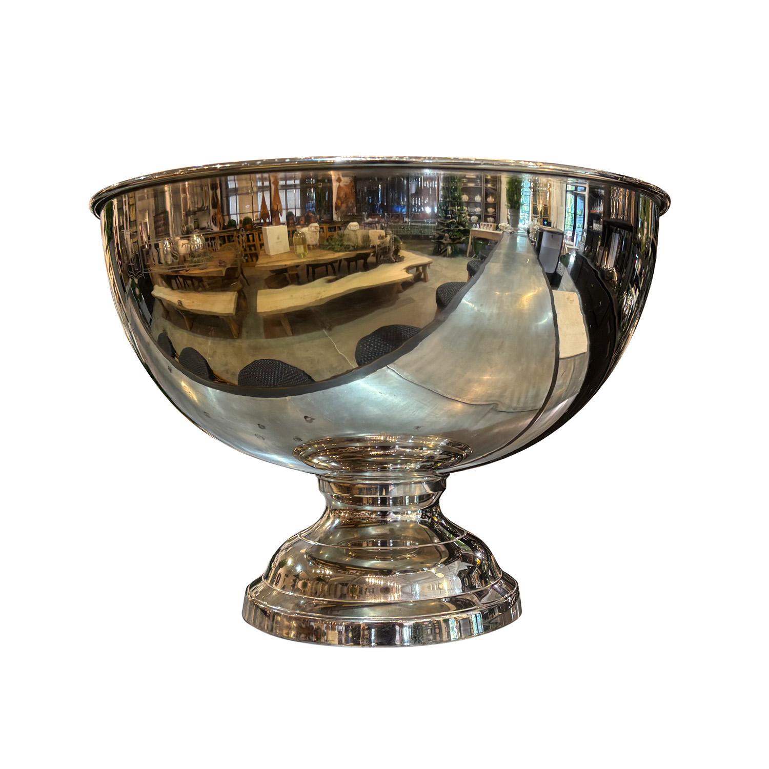 A large vintage French wine or champagne cooler with an edging of LT Louis Tete, in good condition. This decorative table top object is raised on a circular foot. It's most likely silver plated. Minor fading, scratches due to age. Wear consistent