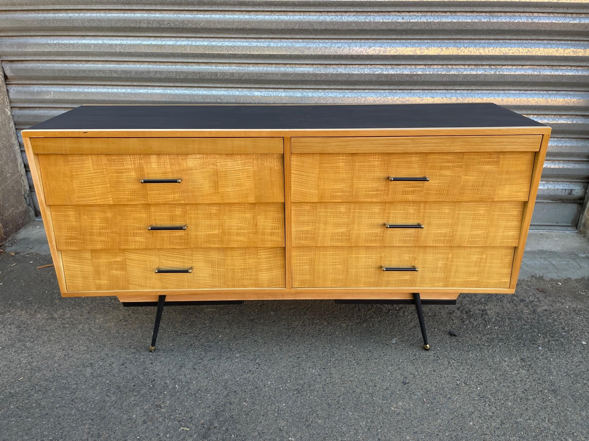 French vintage commode made in the 1960s with six large drawers. 
Two red sliding tops above the drawers. 
The top and the sides has been repainted. 
The bass is in metal and brass. 
Good quality. Some few losses on the top but good general