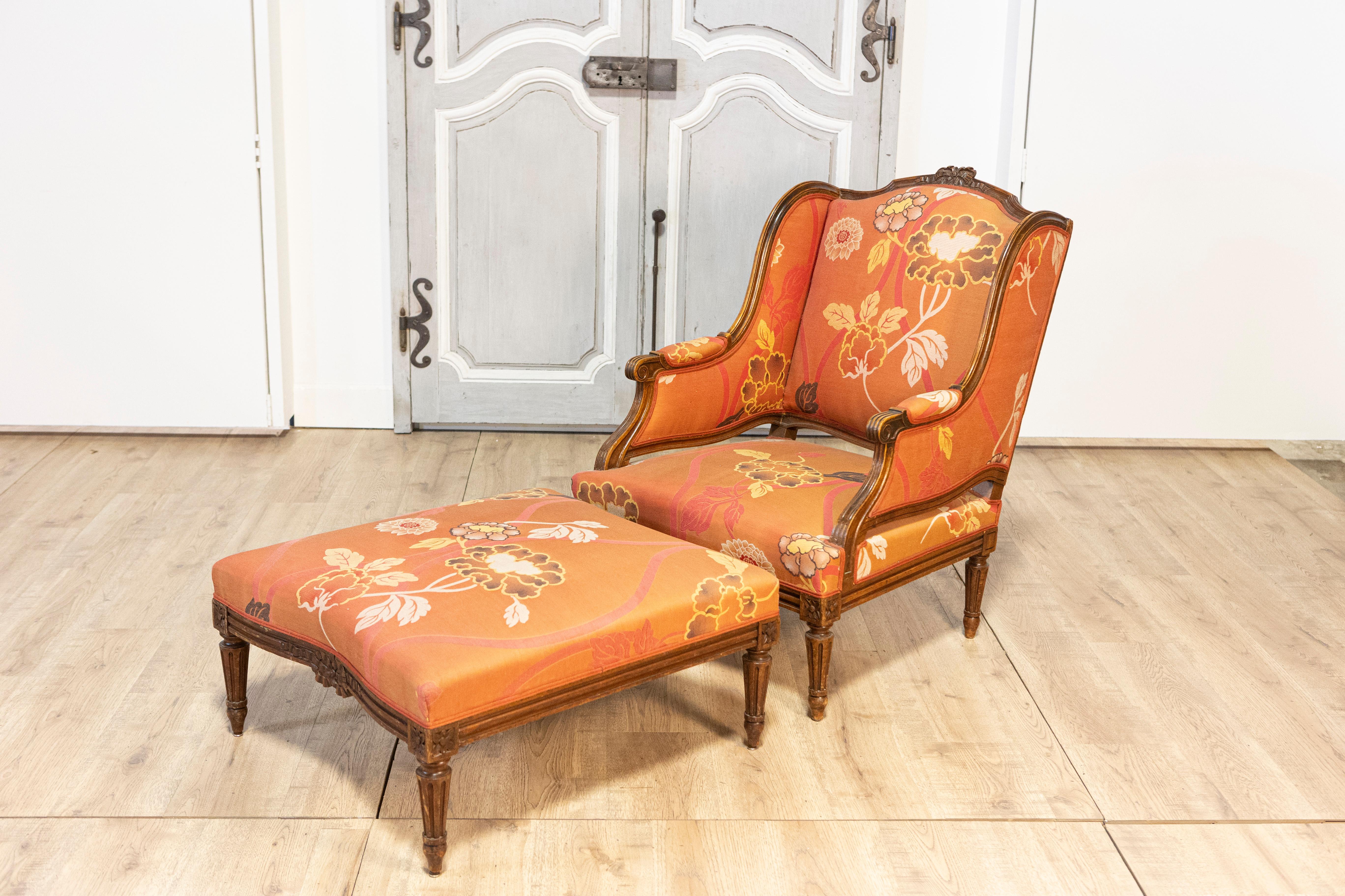 This elegant 20th-century French walnut chair and ottoman set exemplifies the timeless charm of traditional French design. The chair features a beautifully carved walnut frame with intricate detailing, showcasing the craftsmanship and sophistication