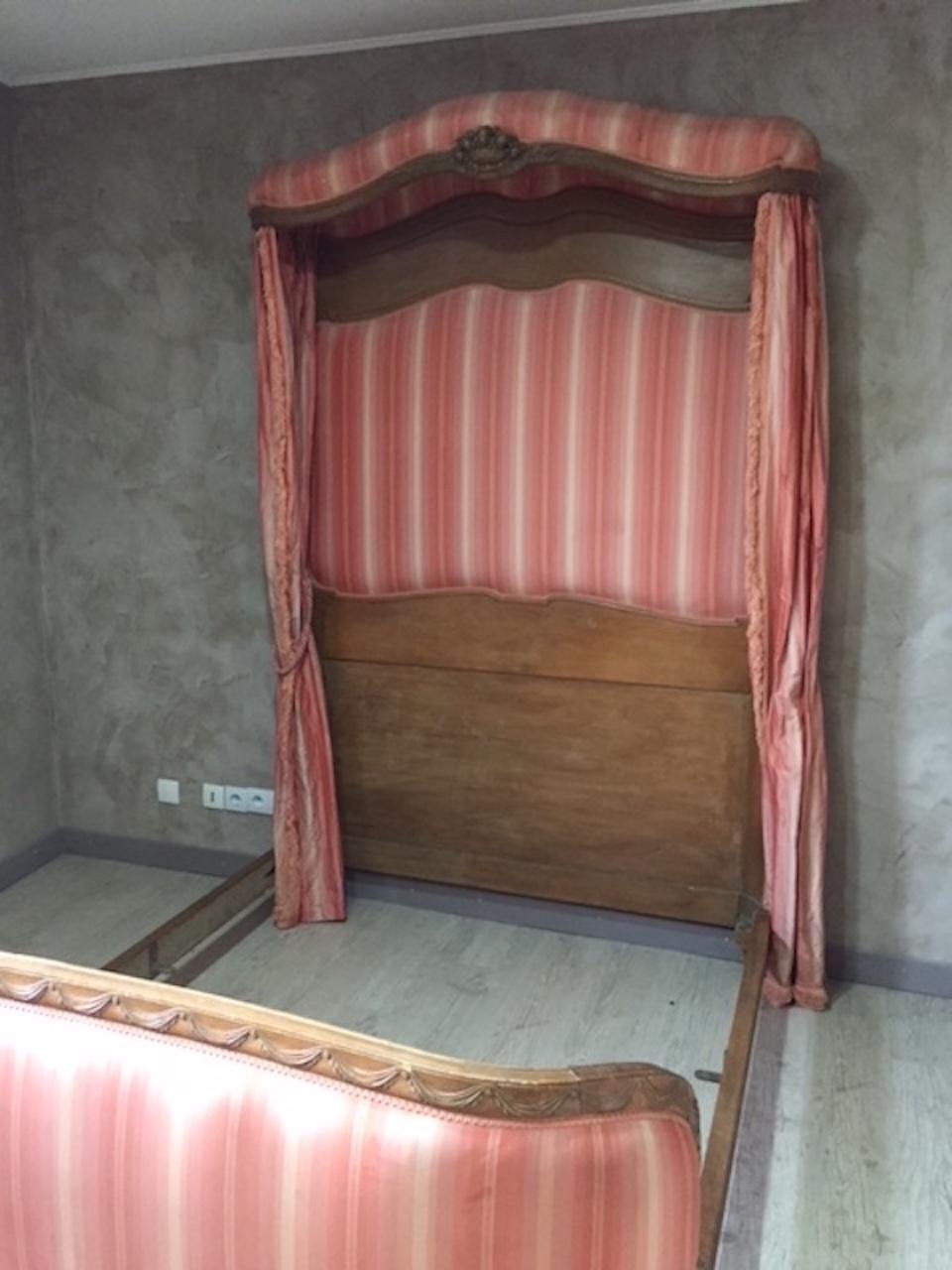 Beautiful and rare 20th century French walnut between Louis XV and Louis XVI style four-poster bed.
The bed is upholstered with pink silk fabric but we think it needs to be changed.
Can be disassembled for transportation. This is a double bed