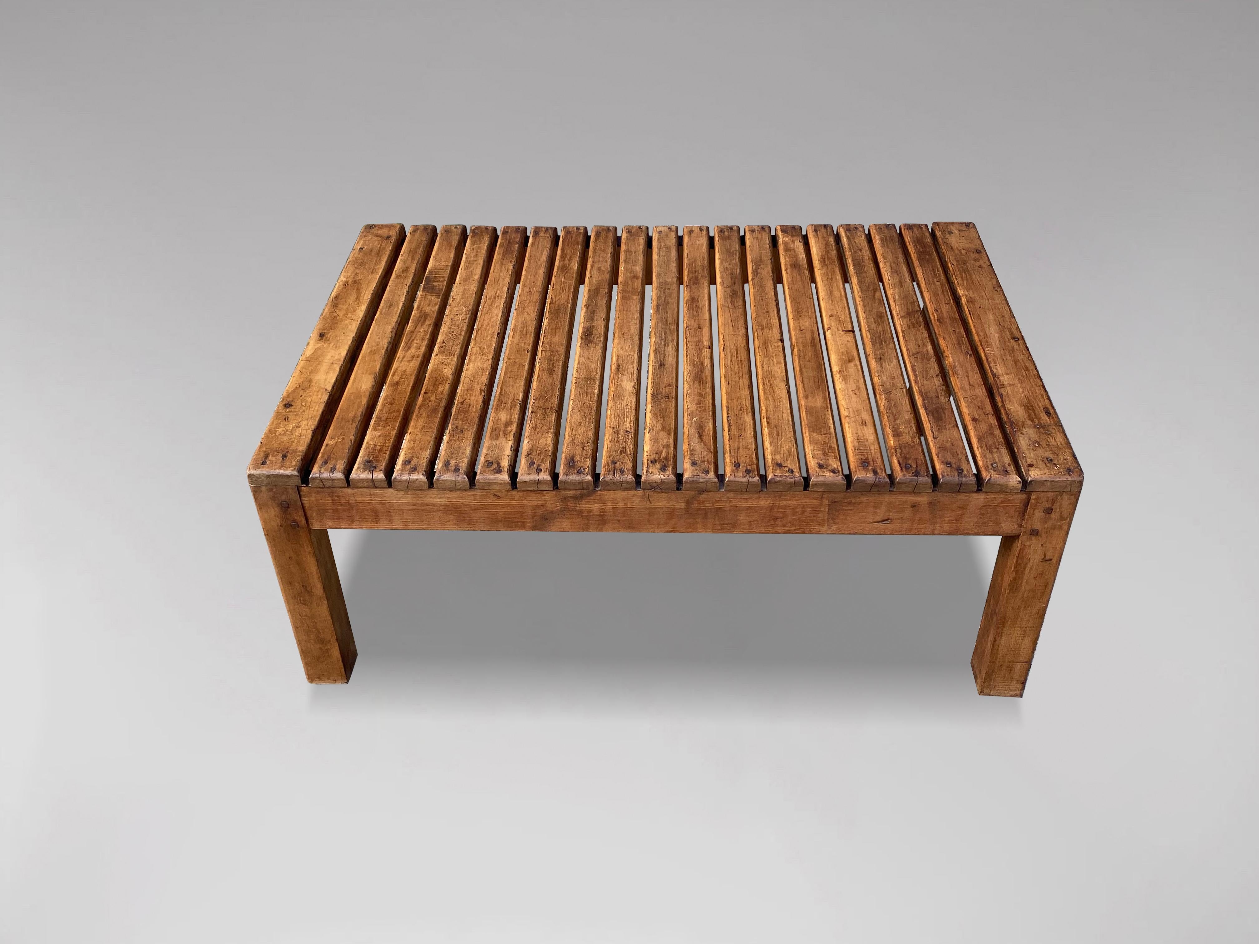 Hand-Crafted 20th Century French Walnut Slat Top Coffee Table For Sale