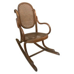 20th Century French Wood and Cane Child Rocking Chair, 1920s
