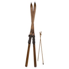 20th Century French Wood and Metal Pair of Ski and Its Sticks, 1900s