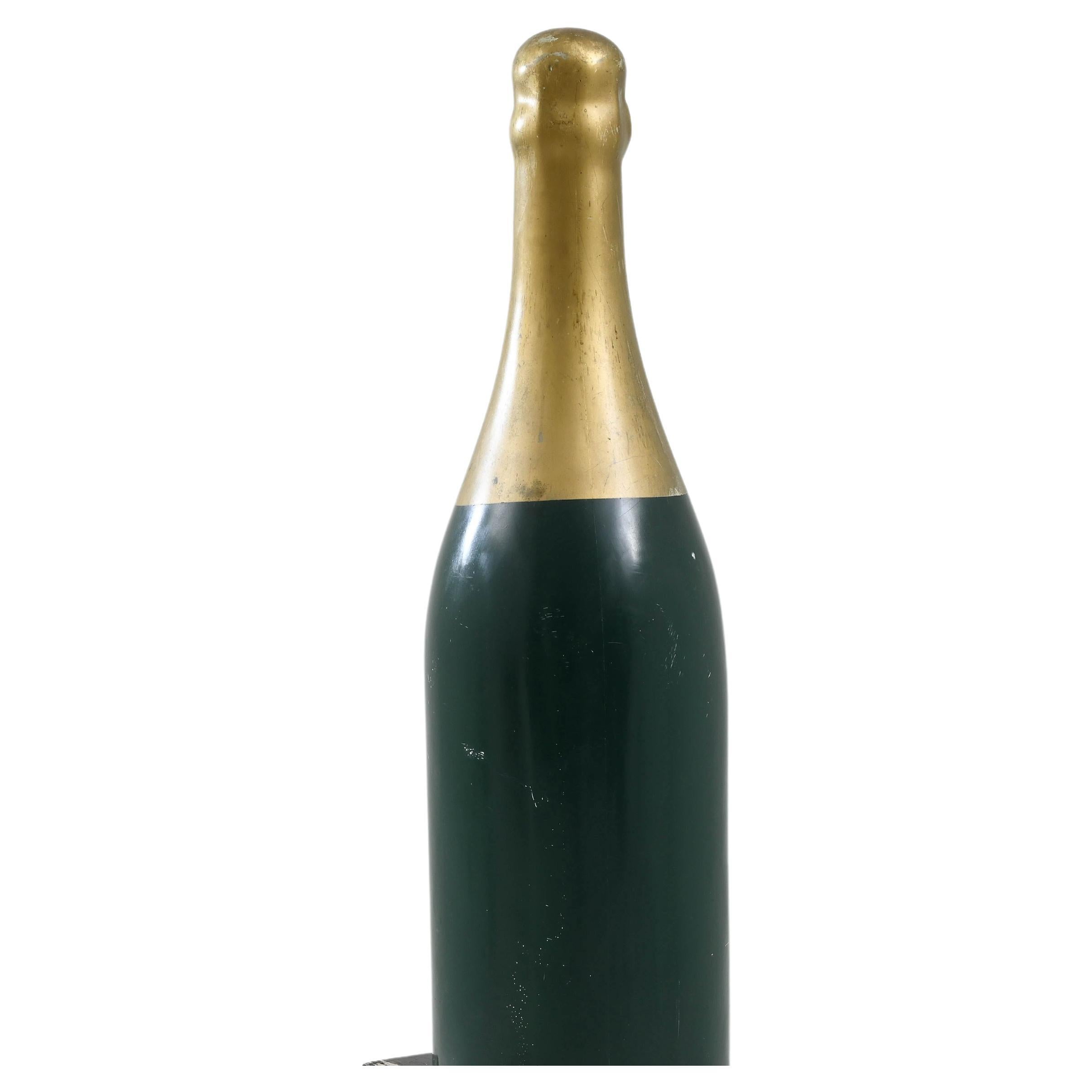 Elevate your space with this eye-catching 20th Century French Wooden Wine Decoration. The vibrant green base, adorned with a luxurious gold 