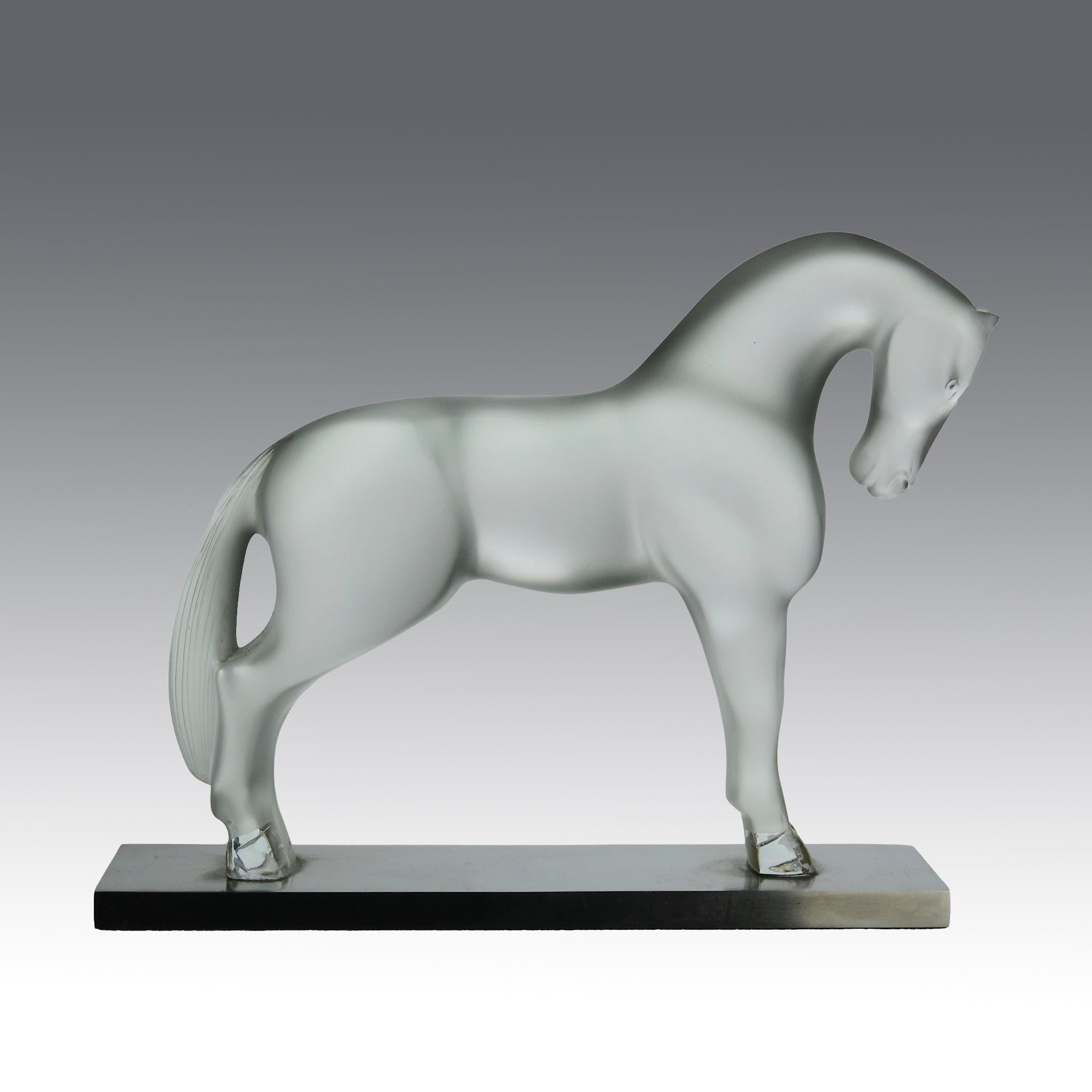 A very fine frosted glass study of a standing horse in a striking position with its neck rounded exhibiting fine detail, the surface lightly polished in areas to create definition, signed Lalique France

ADDITIONAL INFORMATION
Height:               