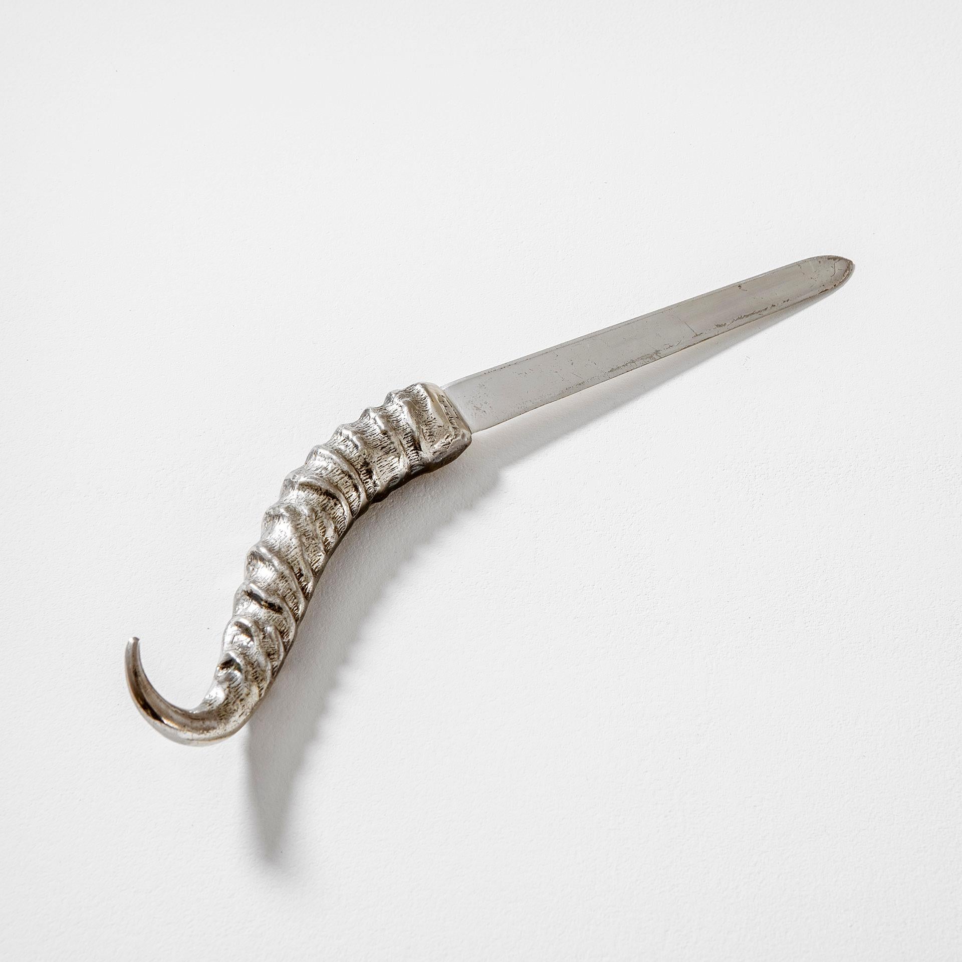 Very peculiar letter opener designed by Gabriella Crespi in '70s. The letter opener has a very beautiful handle in shape of seahorse, the object is in metal. There is the signature of the author as shown in photo.
This article is a great idea for a