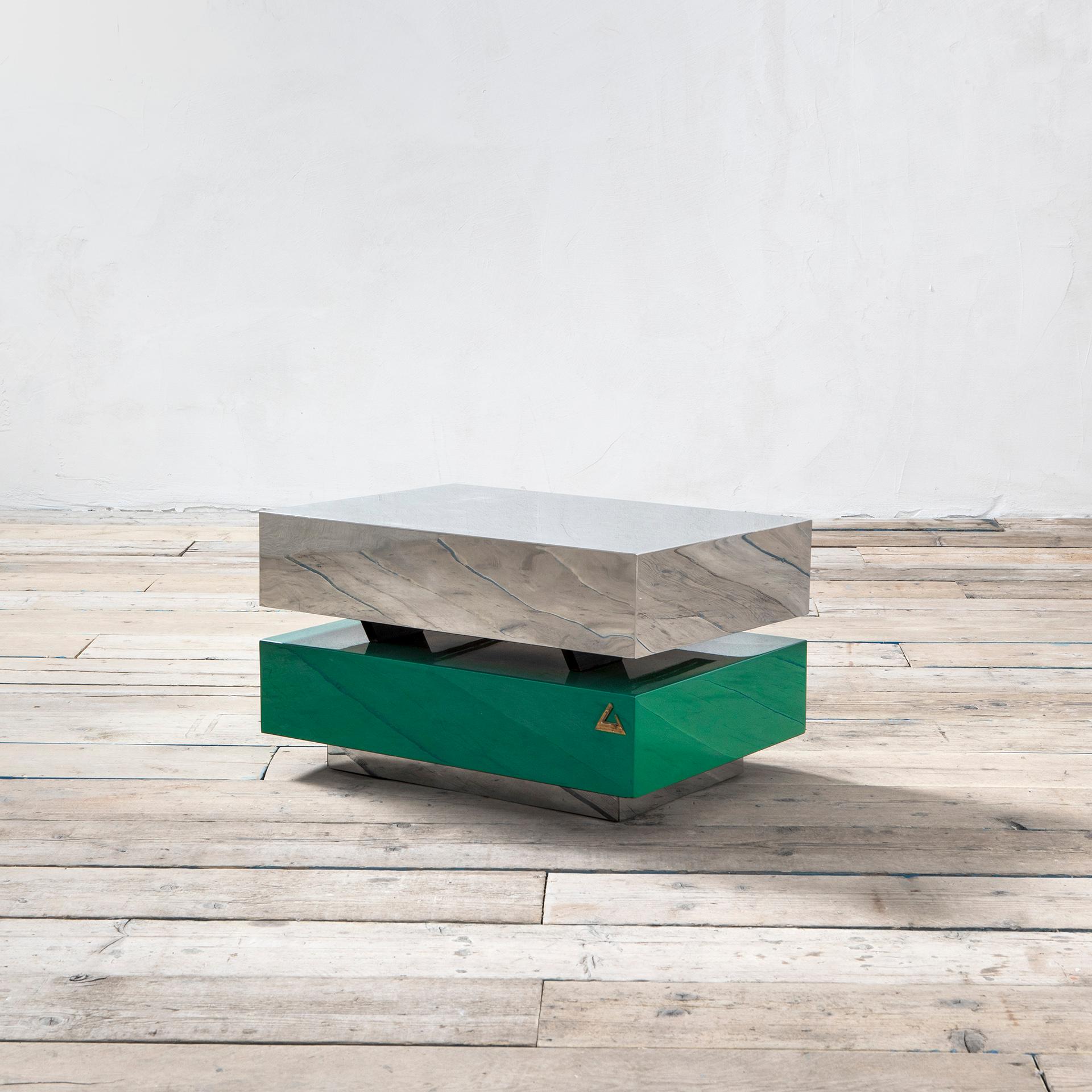 Very rare coffee or centre table designed by the artist Gabriella Crespi for the series Plurimi. The table was designed in '70 and this example was produced in '80s, rare version in lacquered wood and steel. Colored in green and silver. Thet table