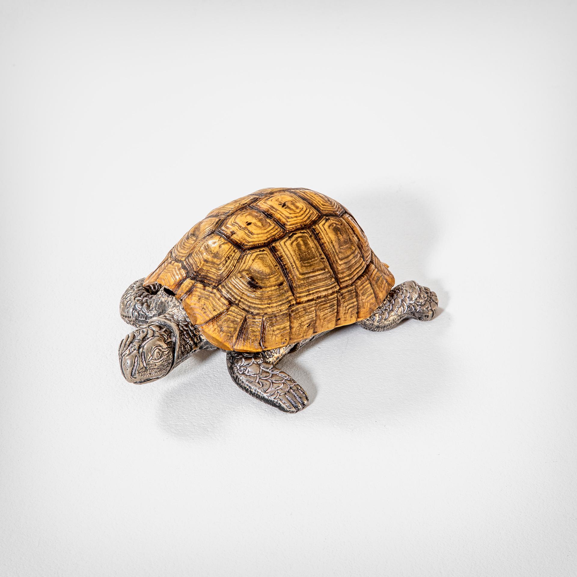 Very realistic Turtle designed by Gabriella Crespi in '70s. The turtle has the structure in Silvered Metal, the shell could be opened and inside you can put some jewelry or little object. Perfect fos gift or for the entrance or even as Desk