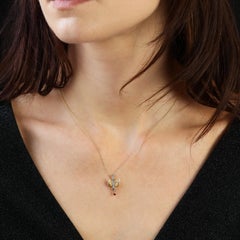 Collana con ciondolo a forma di colomba in oro giallo 14 carati del 20° secolo