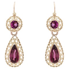 Orecchini a pendente in oro giallo 18 carati con granato del XX secolo