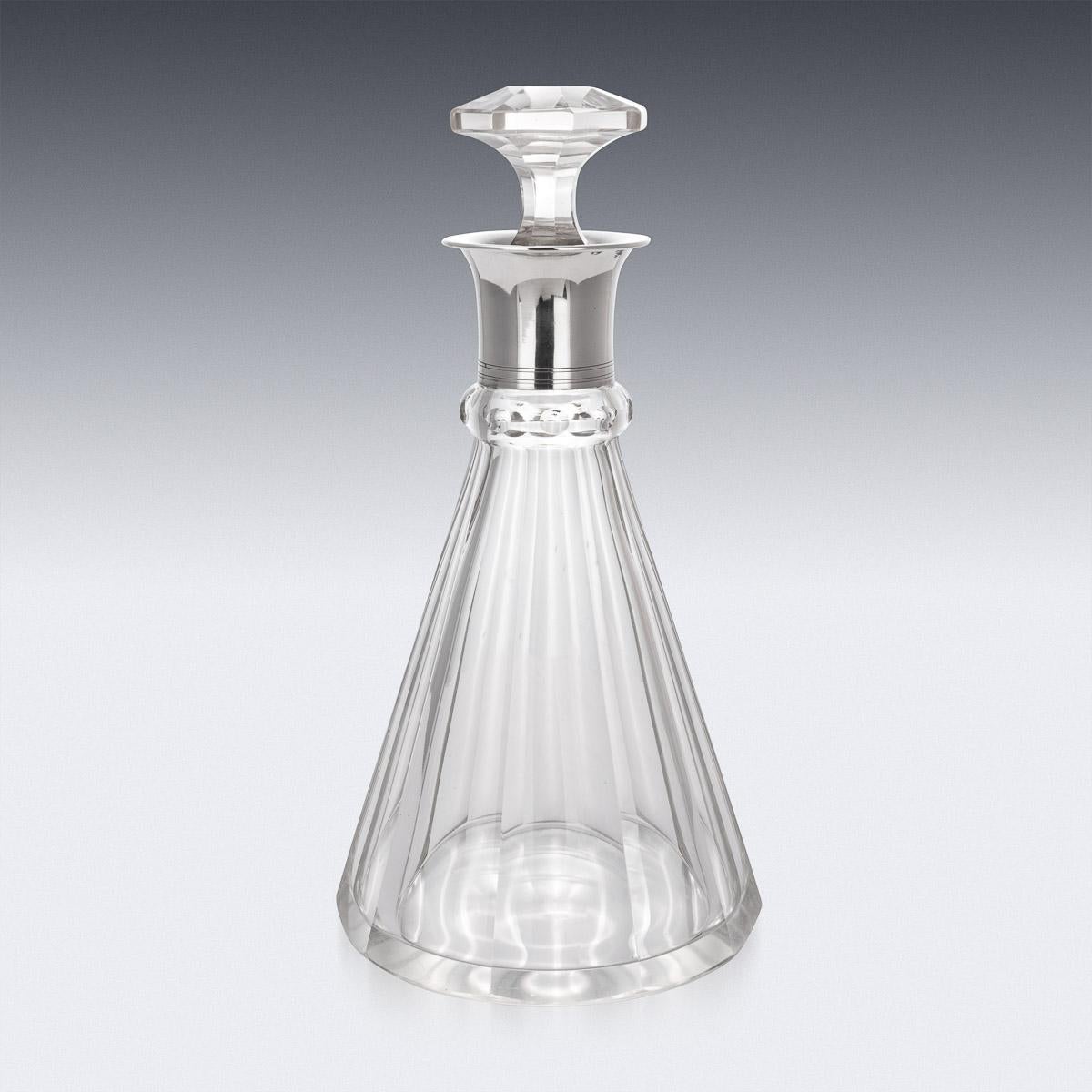 Antique early 20th century German Art Deco solid silver and glass large decanter. Of particularly large size with straight cut crystal glass body and mounted with elegant octagonal stopper. Applied with a stylized silver collar. This large decanter