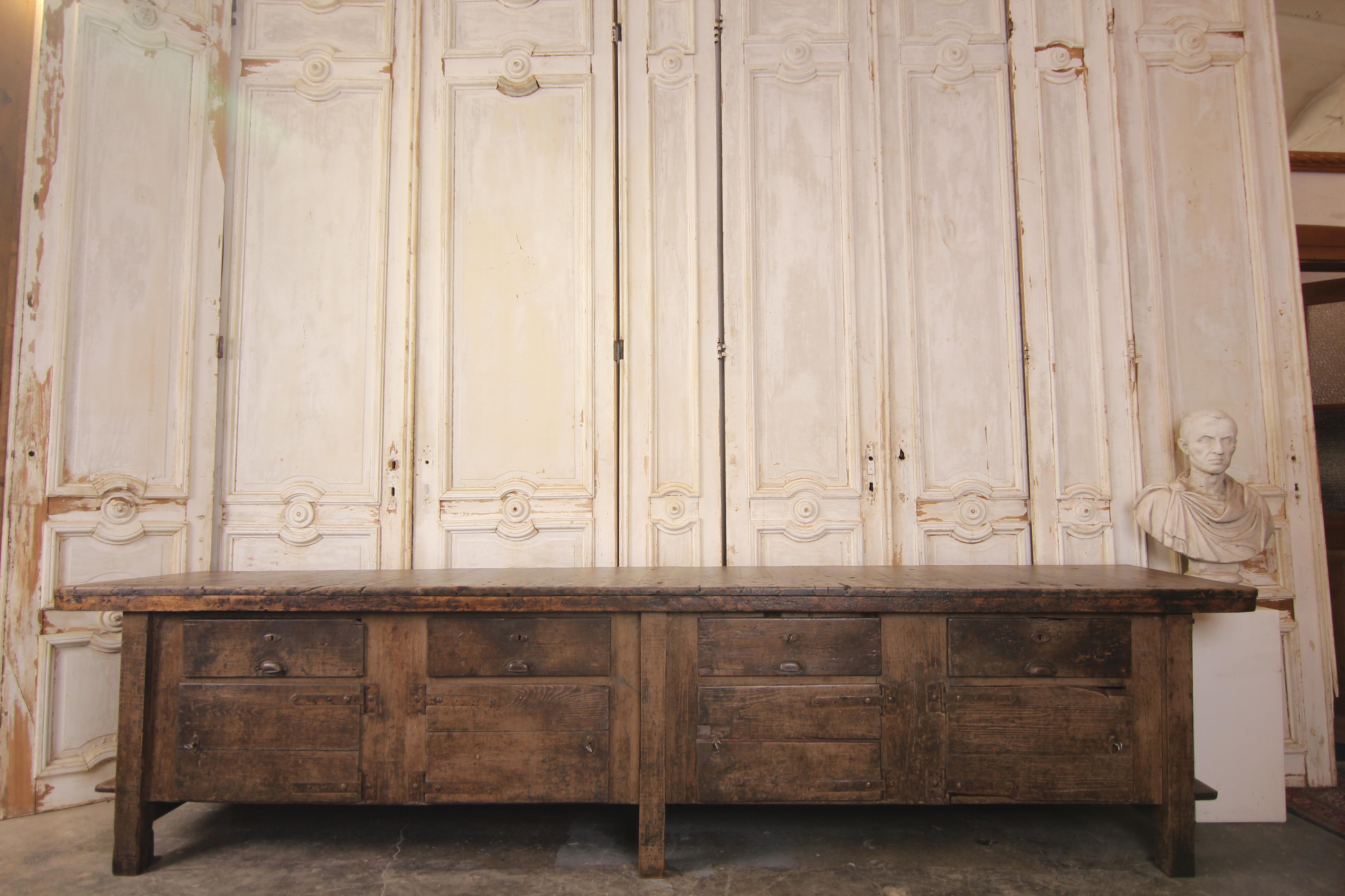 Large vintage industrial workbench with doors and drawers. Surface with beautiful patina. 
Perfect as kitchen island, product presentation table, sideboard, or anywhere else just as an eye-catcher.

Dimensions: 
82 cm high / 32.3 inch high,
350