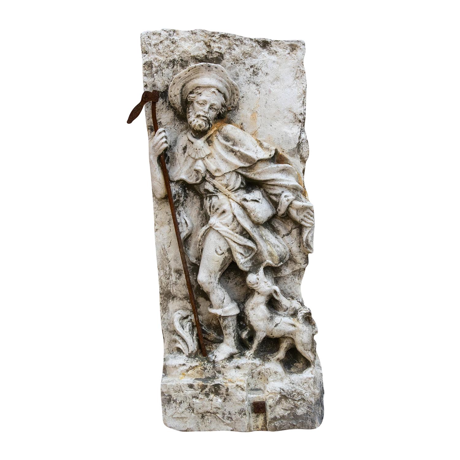 An antique German hand carved marble relief in Baroque style representing St. George slaying the Dragon (right), in good condition. The lance is made of iron. Hand carved marble relief in Baroque style representing St. Jacob (left). The pilgrim's