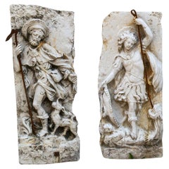 Siglo XX Pareja alemana de antiguos relieves de mármol de estilo barroco