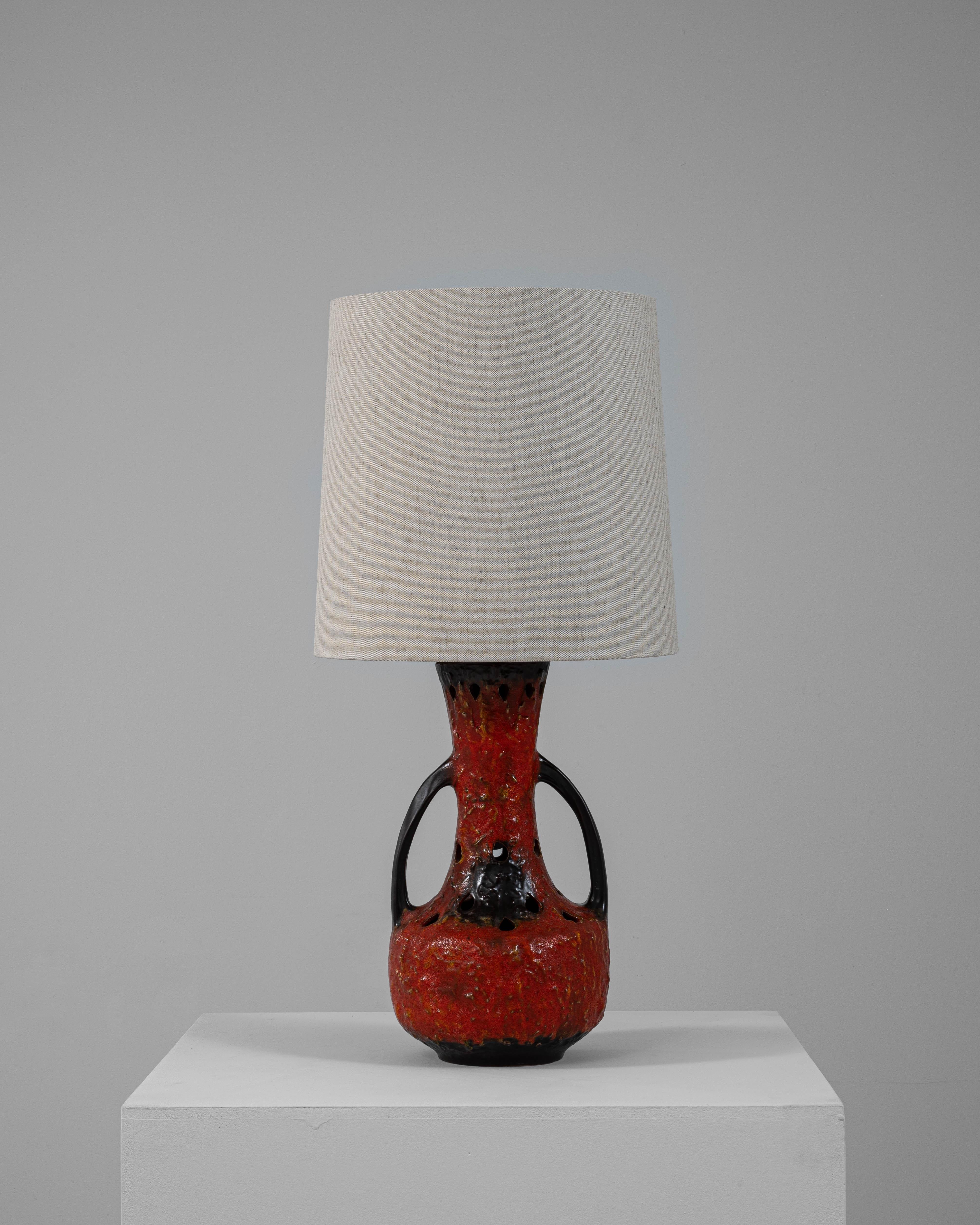 This 20th-century German ceramic table lamp showcases the iconic 