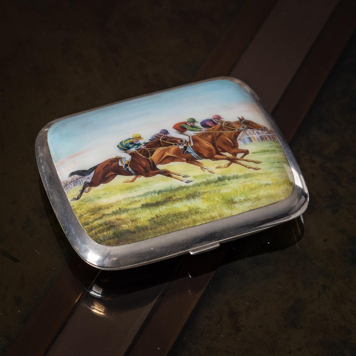 Antique early 20th Century German solid silver & enamel cigarette case, of slightly cushioned rectangular form with rounded corners, depicting a three horse race and richly parcel gilt interior. Both sides are Hallmarked German silver (935
