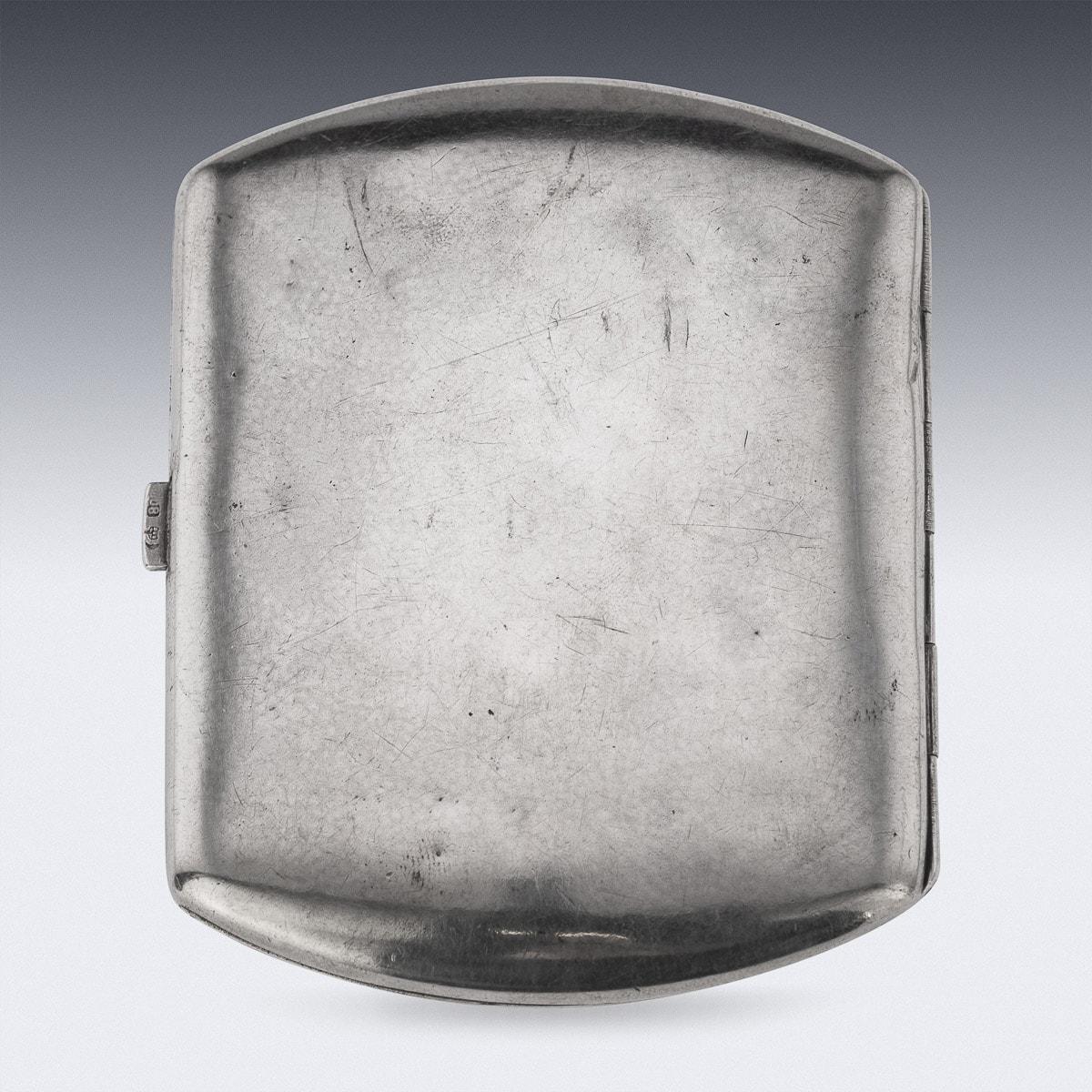 Antique early 20th Century German solid silver cigarette case. The silver has been hand engraved with a floral and scroll band with the initials FE below and applied with a sapphire stone to the lid. Hallmarked German silver (800 grade silver),