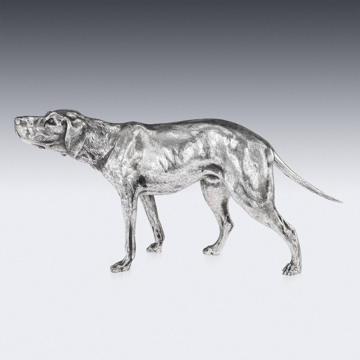 Antique 20th Century German large solid silver statue, beautifully and realistically modelled as a hunting dog, a German shorthaired pointer. Hallmarked with a German silver marks (925 standard).

Height: 22cm
Width: 47 x 8cm
Weight: 1340g