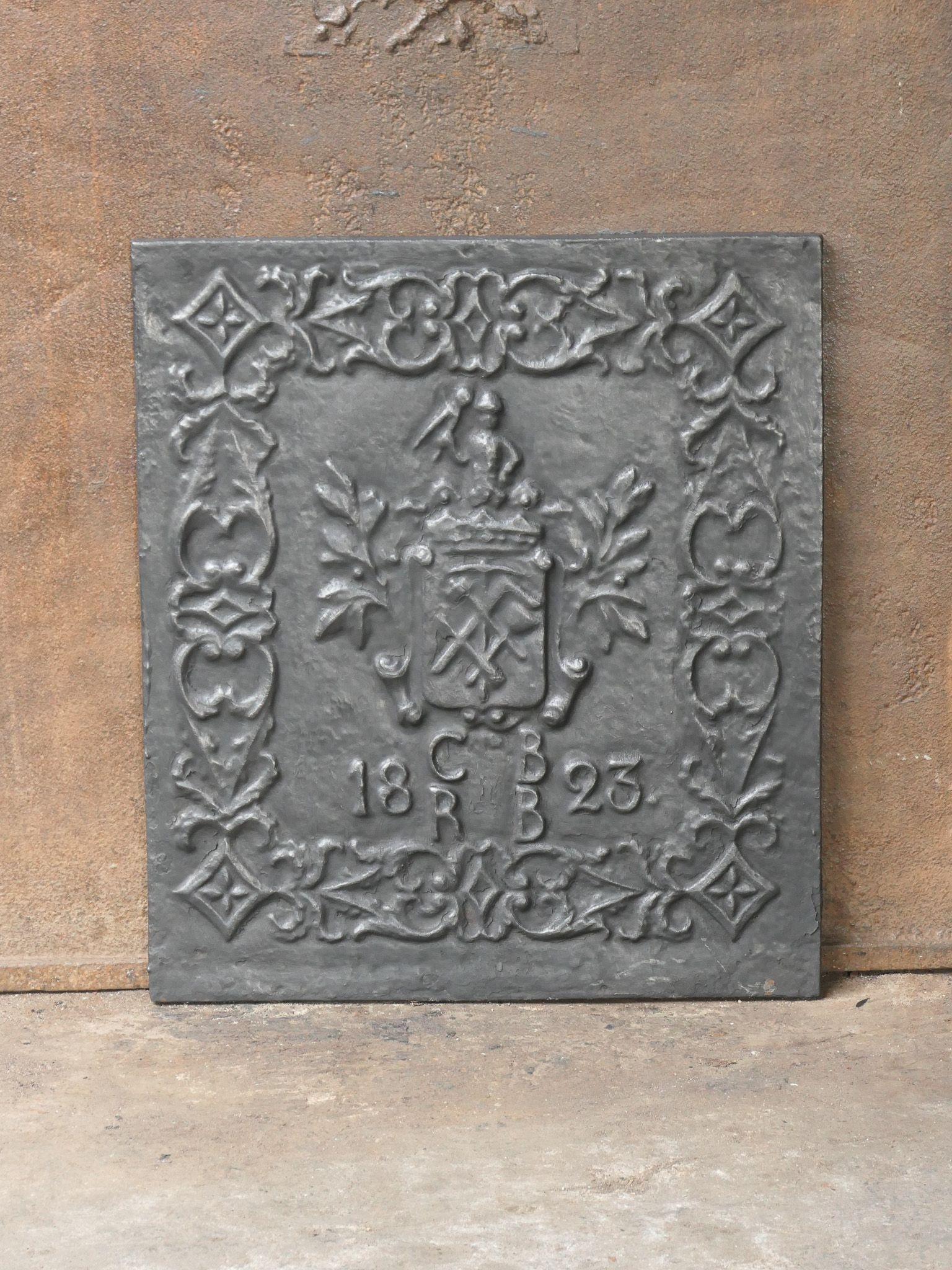 20th century German Victorian Style 'Coat of Arms' Fireback / Backsplash

The fireback is made of cast iron and has a black / pewter patina. The condition is good, no cracks.