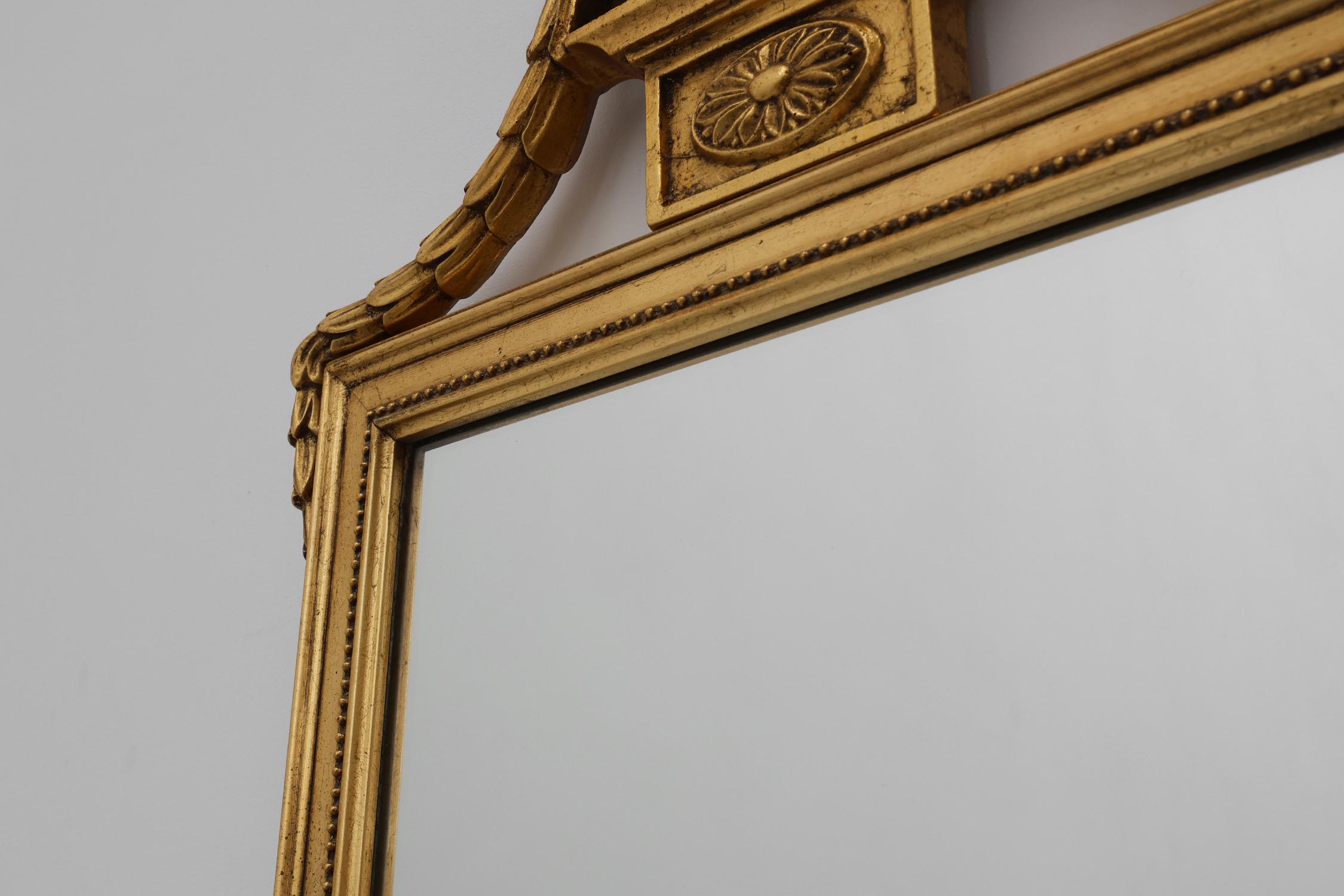 20th Century gilded wooden Empire style mirror with eagle on top in vendita 2