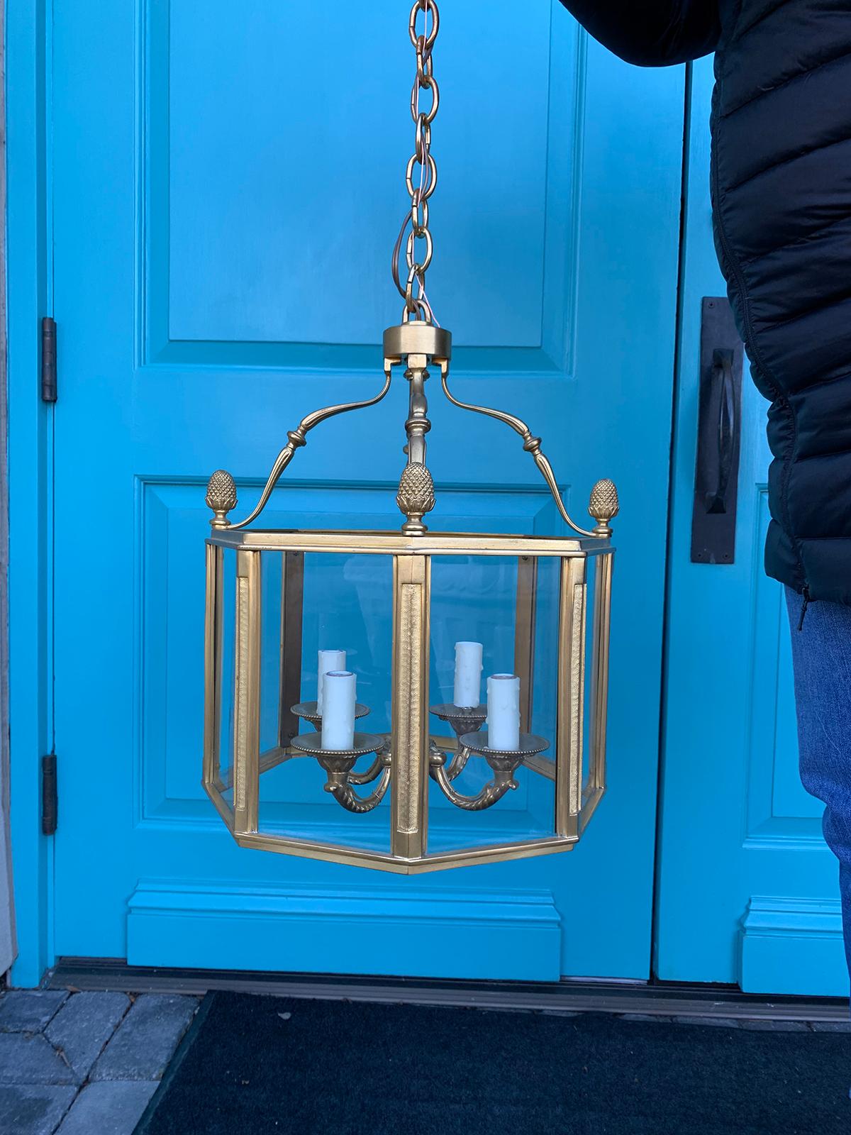 20th century gilt bronze Louis XVI style octagonal four-light lantern
Brand new wiring
Please note the glass is clear - turquoise showing is of our front door.