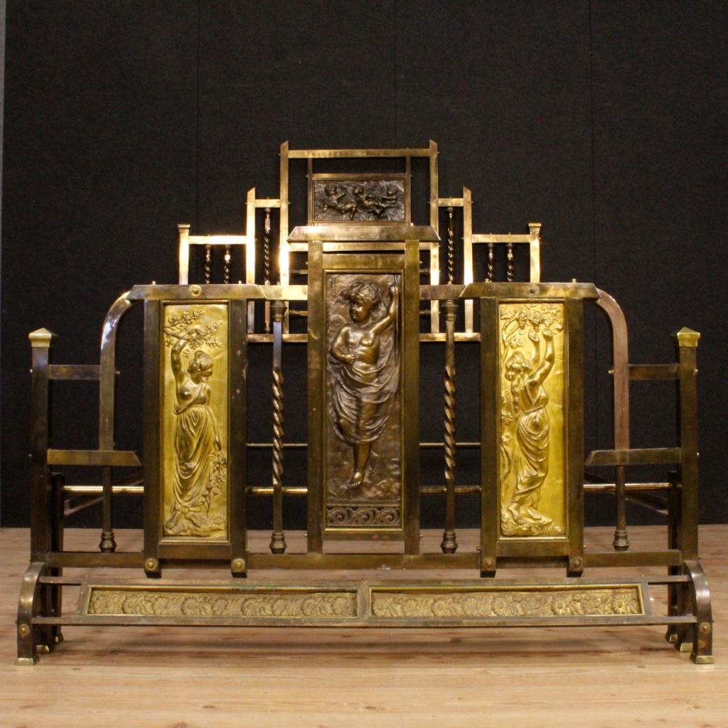 Great Italian double bed from the mid-20th century. Object of fabulous quality and decoration in worked metal, bronze and gilded brass. Bed adorned with plaques depicting female characters of neoclassical style and little angels. Object of great