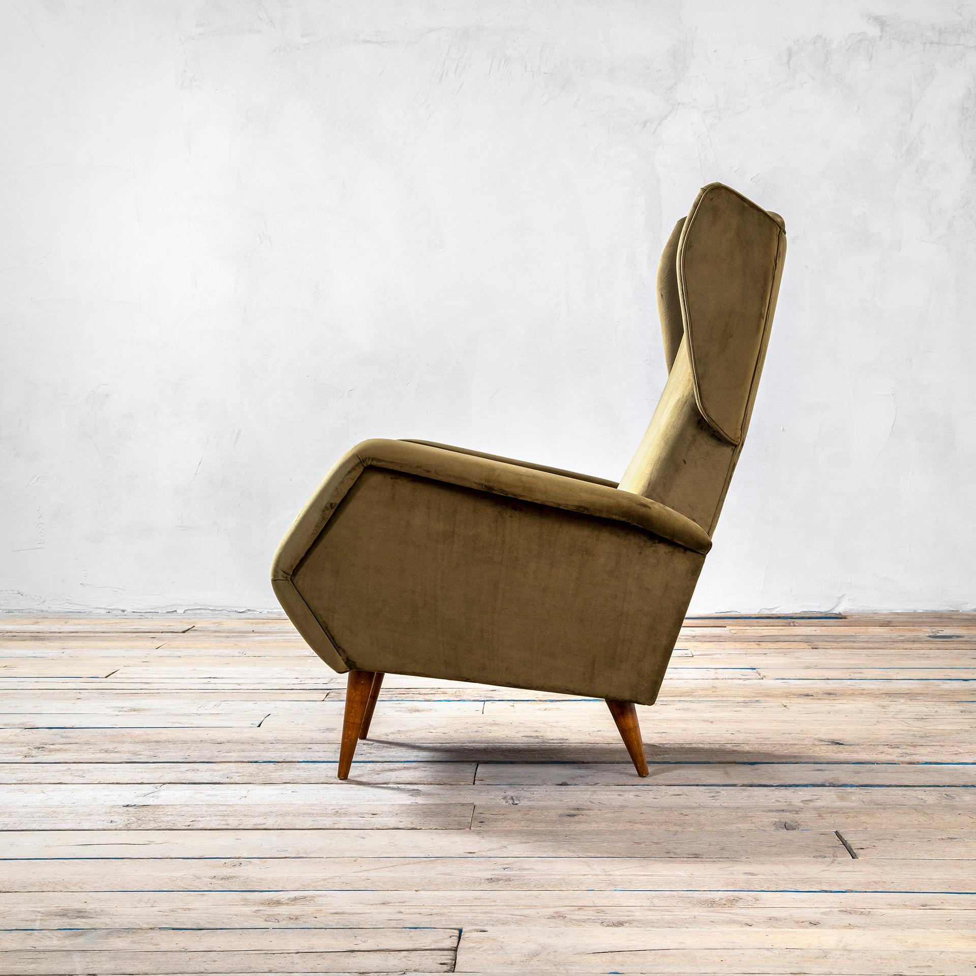 Pair of armchairs designed by Gio Ponti for Cassina in '50s. The armchair has a wooden structure with 4 wooden feet, and fabric upholstery. The model of the armchairs remember a kind of bergere, but its style is in definitive more modern. This model