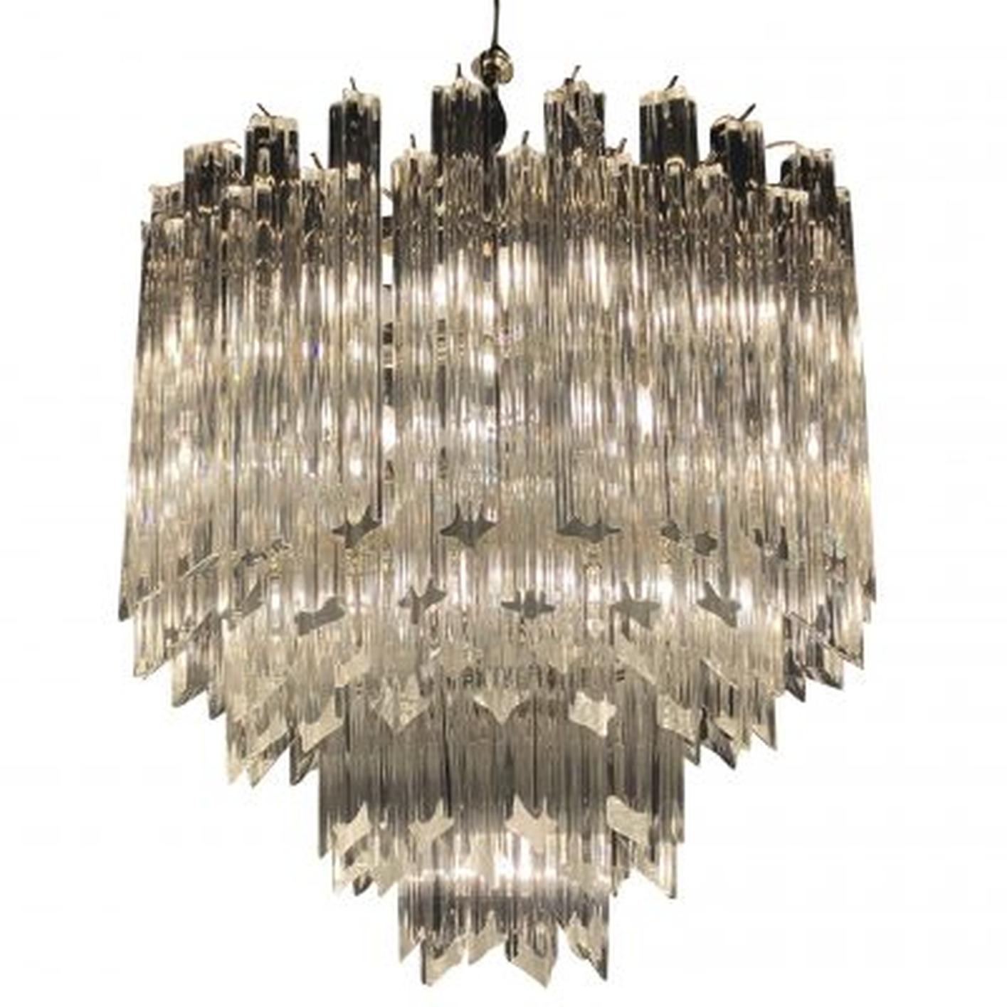 A Murano chandelier by Paolo Venini. Wear consistent with age and use. Circa 1960 Murano, Italy.

Paolo Venini was born in 1895 Cusano near Milan, Italy and passed away in 1959 Venice, Italy. He was an Italian lawyer and designer. In 1921, Venini