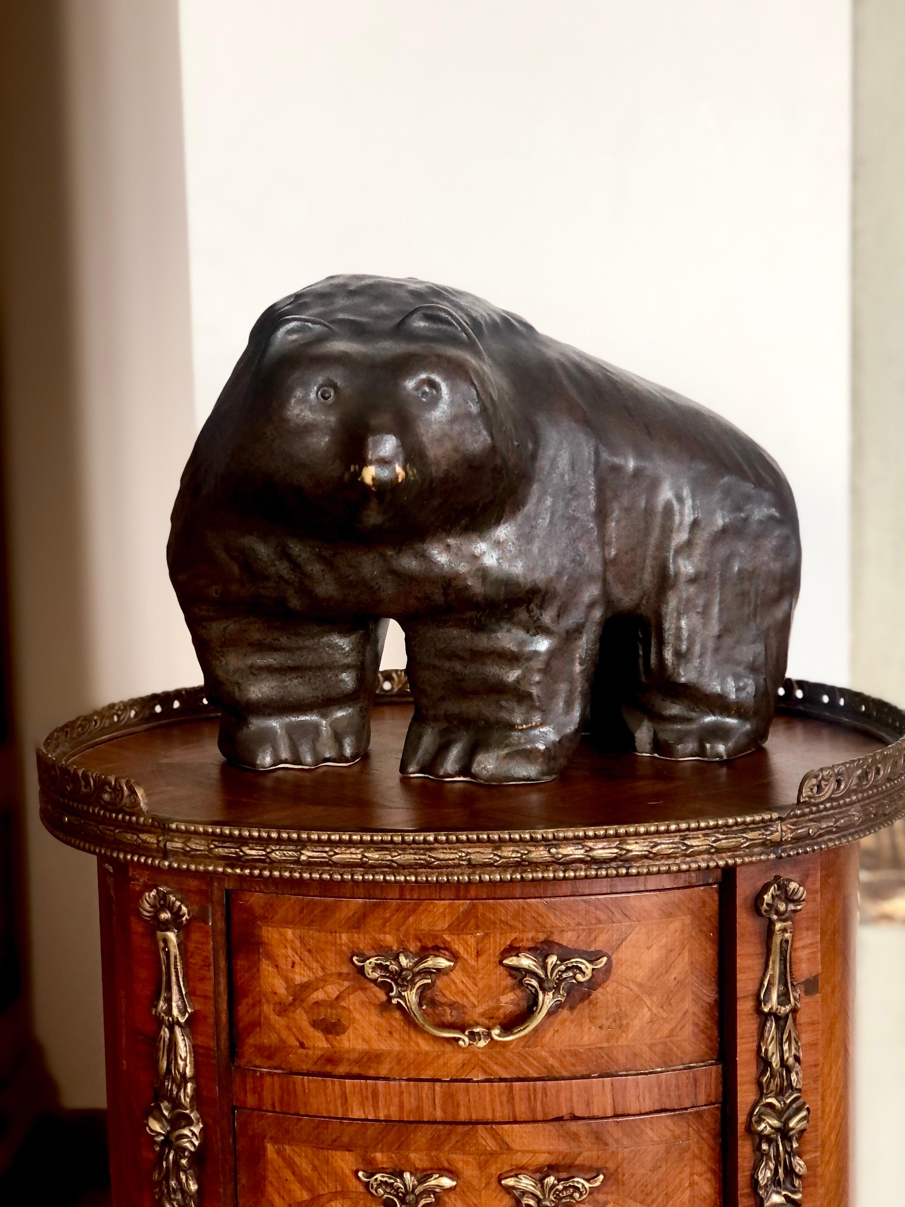 1960s Finnish brown bear sculpture in glazed ceramic by Taisto Kaasinen for Arabia.
Signed by the artist under the front paw.
Perfect condition.
Finland.