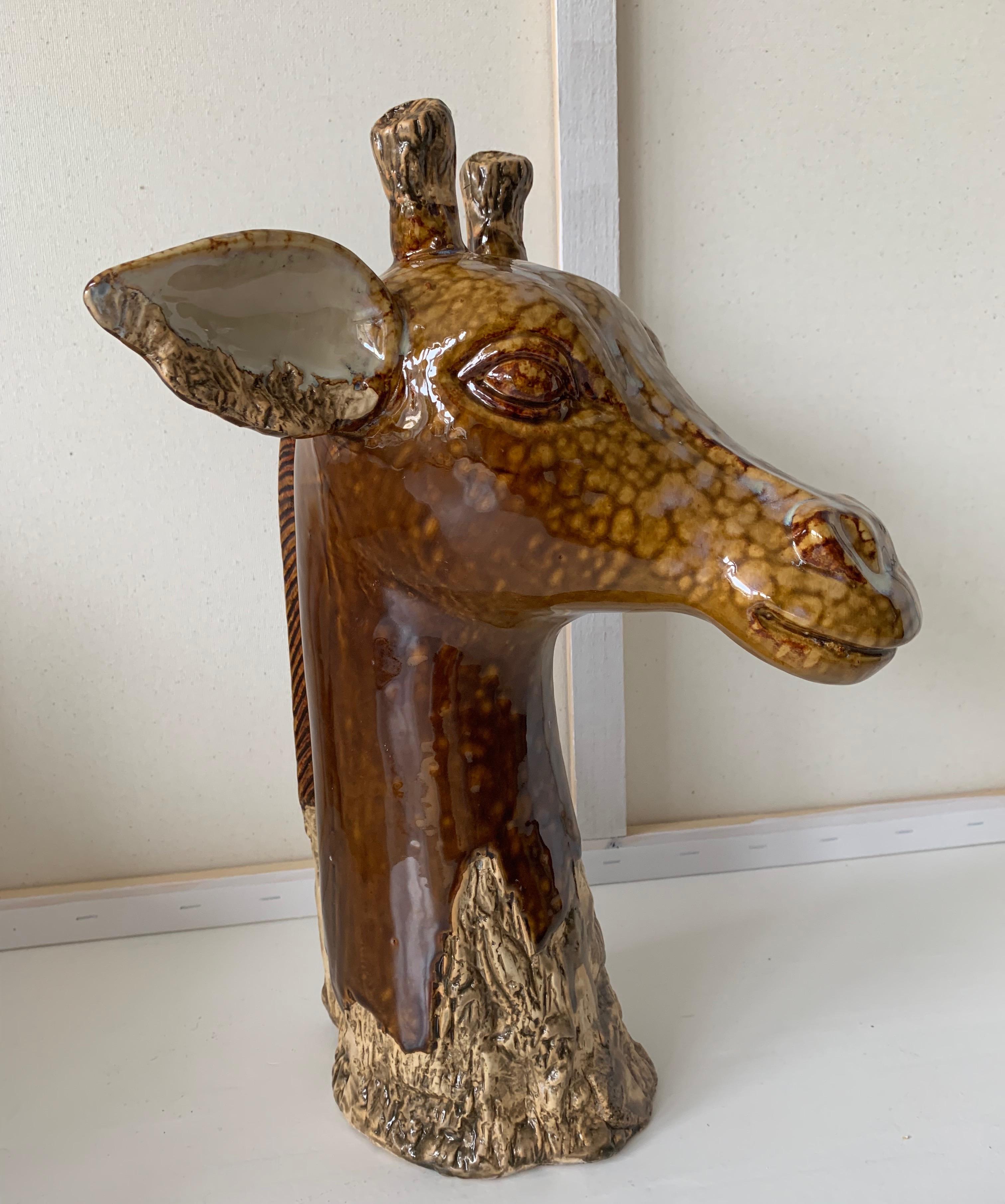 Rare and highly decorative giraffe sculpture.

Anyone who has ever been to Africa and saw these majestic animals in the wild will never forget the sight of them. The graceful manner in which these giants of the savannah move and their beautiful