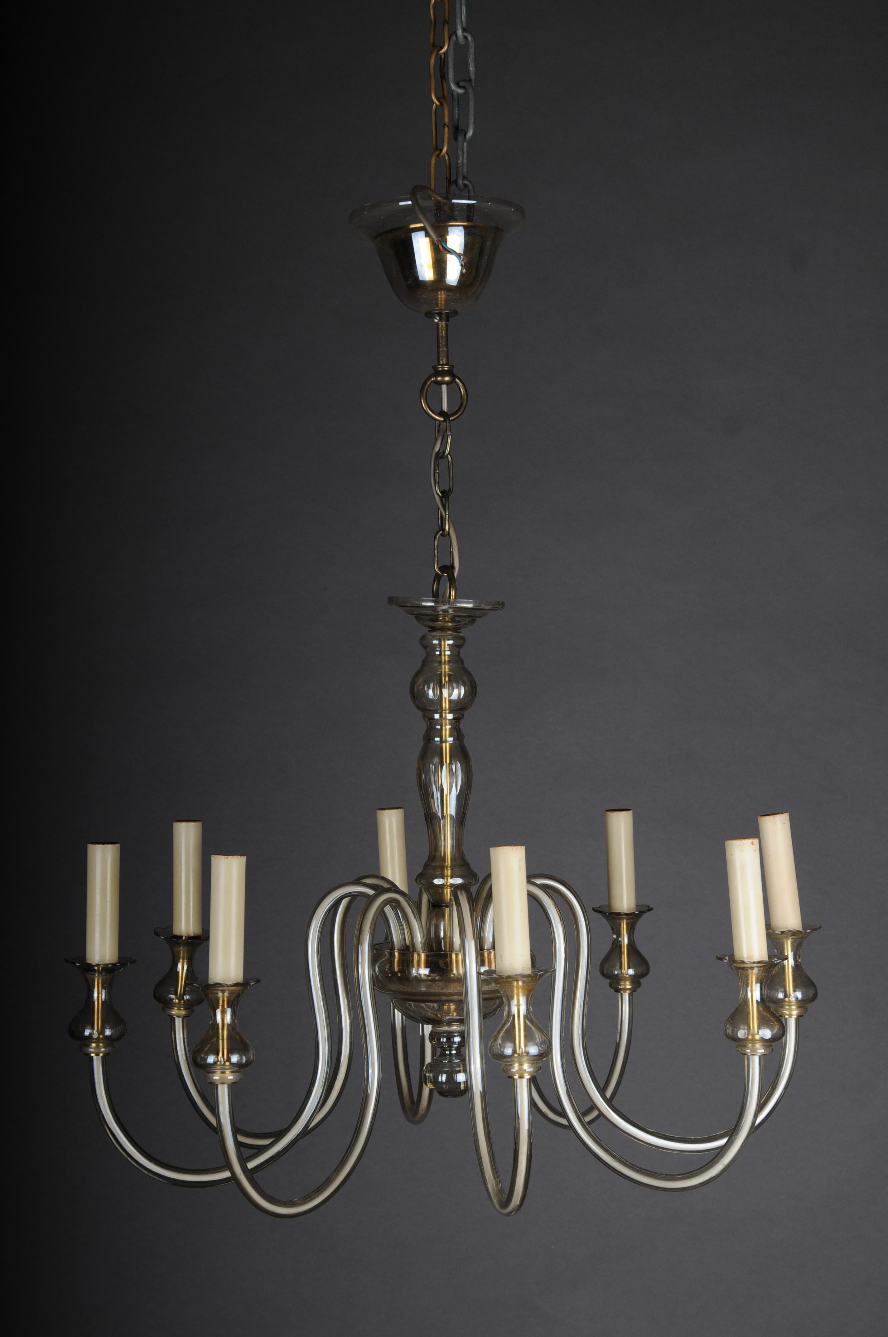 20th Century Glazed Italian chandelier


Impressive modern chandelier with 8 light arms. Entire body made of smoked glass. Very noble Italian design.