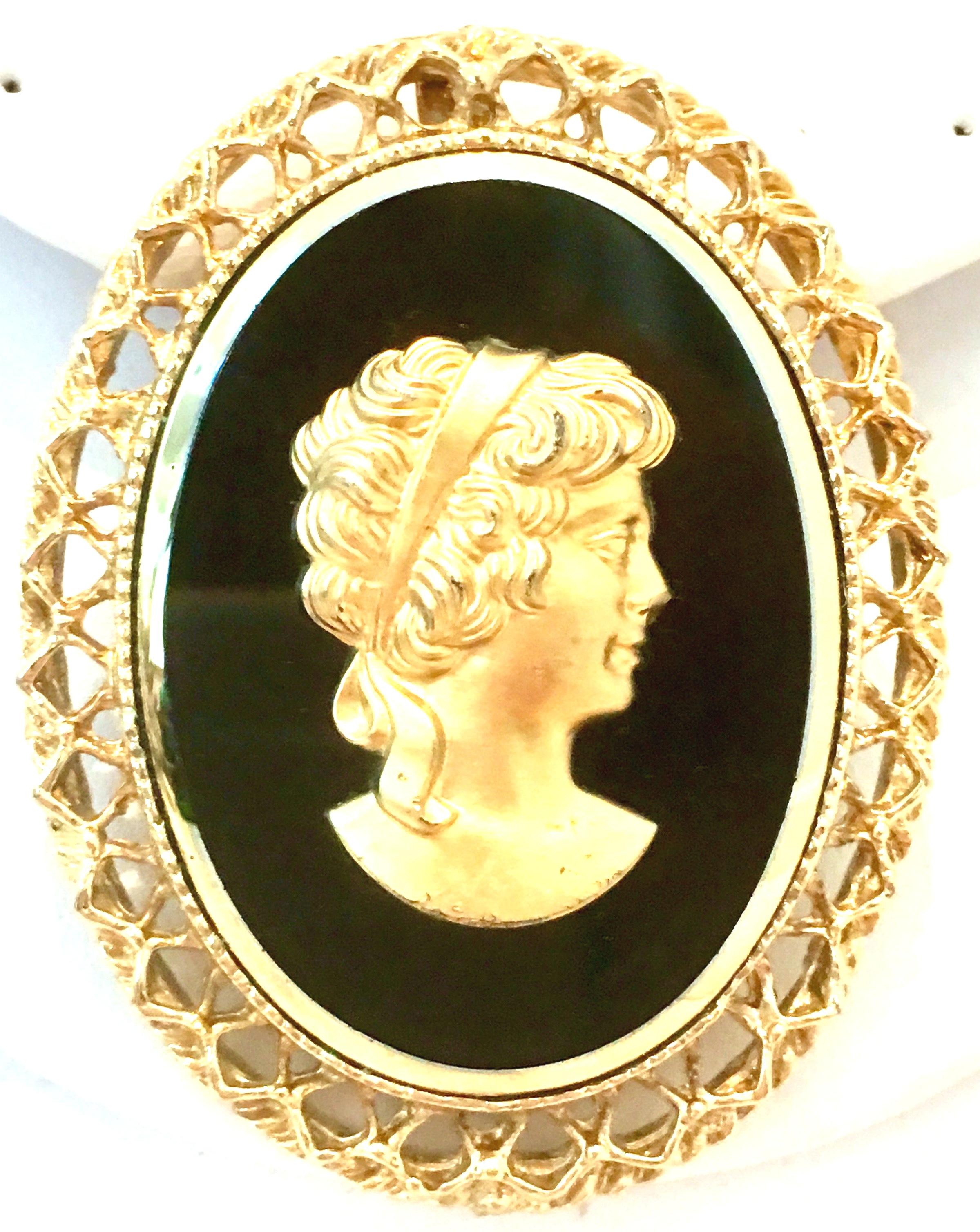 20th Century Gold Plate Cut Glass & Gold High Relief Cameo Brooch & Necklace Slide. This charming right facing woman gold cameo sitting atop a black cut glass bezel set cameo can be used as a pendant necklace enhancer and or a classic brooch. 
