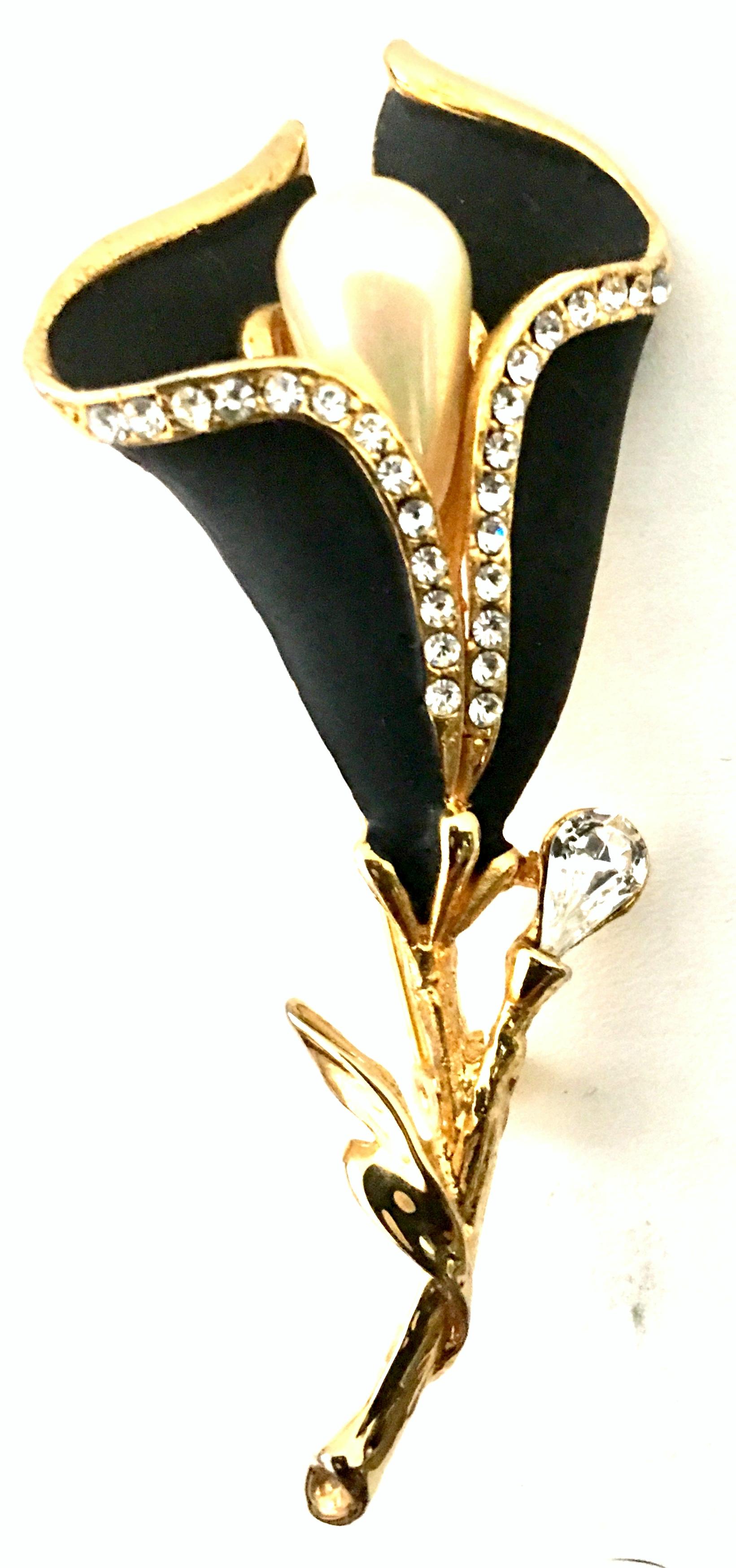 20th Century Gold, Enamel, Crystal Clear Rhinestone & Faux Pearl Flower Brooch.  This lovely dimensional flower brooch features, gold plate metal with black enamel, pave set crystal clear rhinestones and a large iridescent faux pearl measures