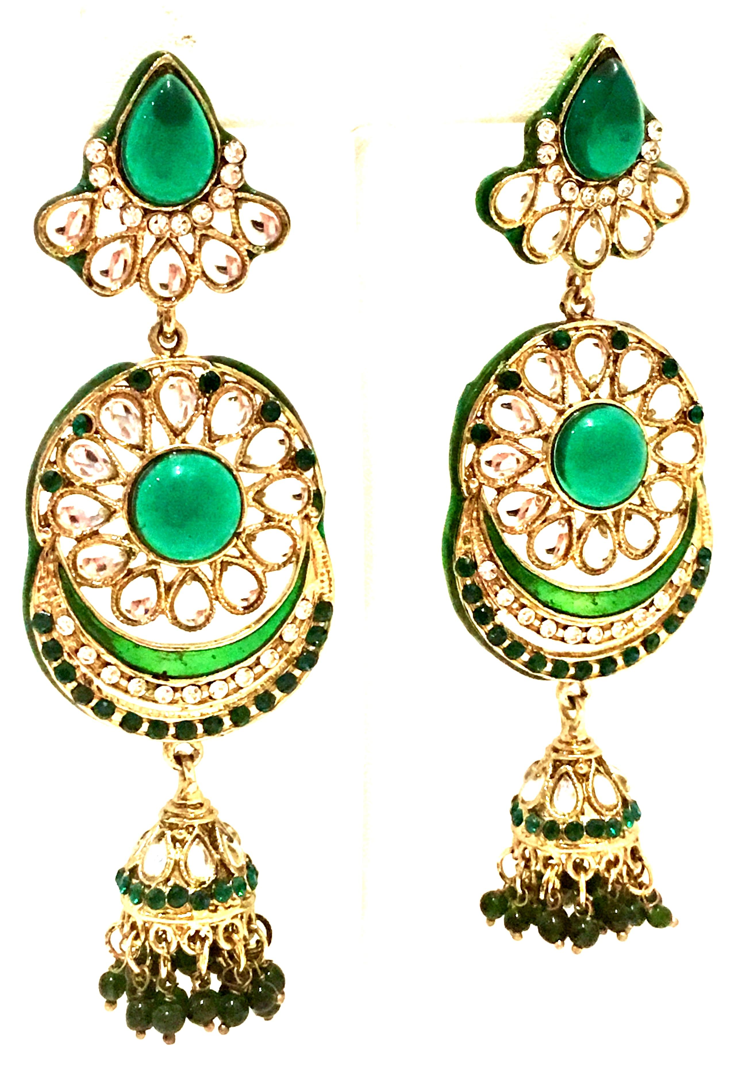20th Century Pair Of Gold, Austrian Crystal, Enamel, Resin Bead And Molded Glass Chandelier Earrings. These dramatic gold plate Maharaja style 4.25