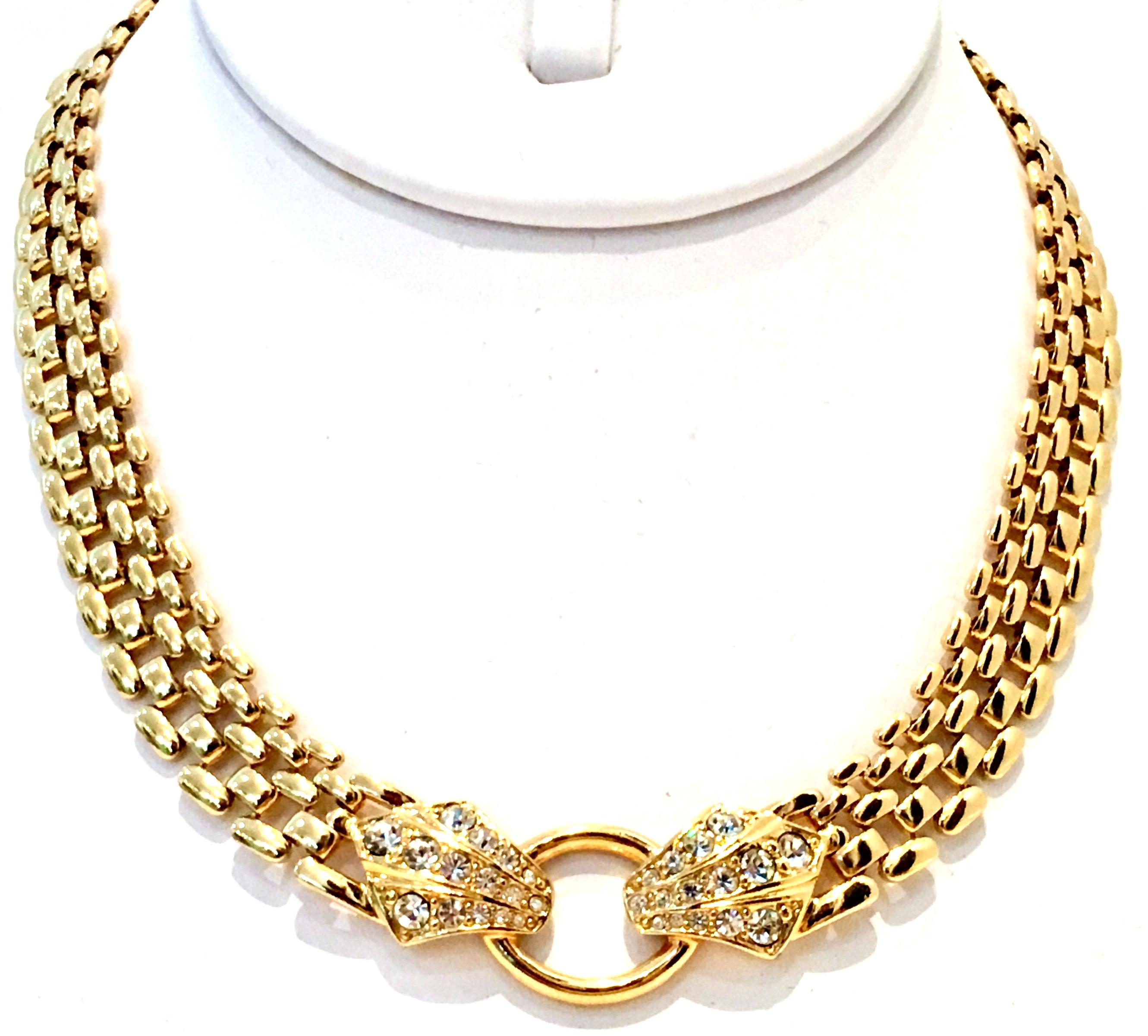 20th Century Rare Gold Plate Chain Link & Swarovski Crystal Clear Rhinestone Double Snake Head Choker Style Necklace By, Trifari. Features a fold over box style clasp, signed on the underside, 