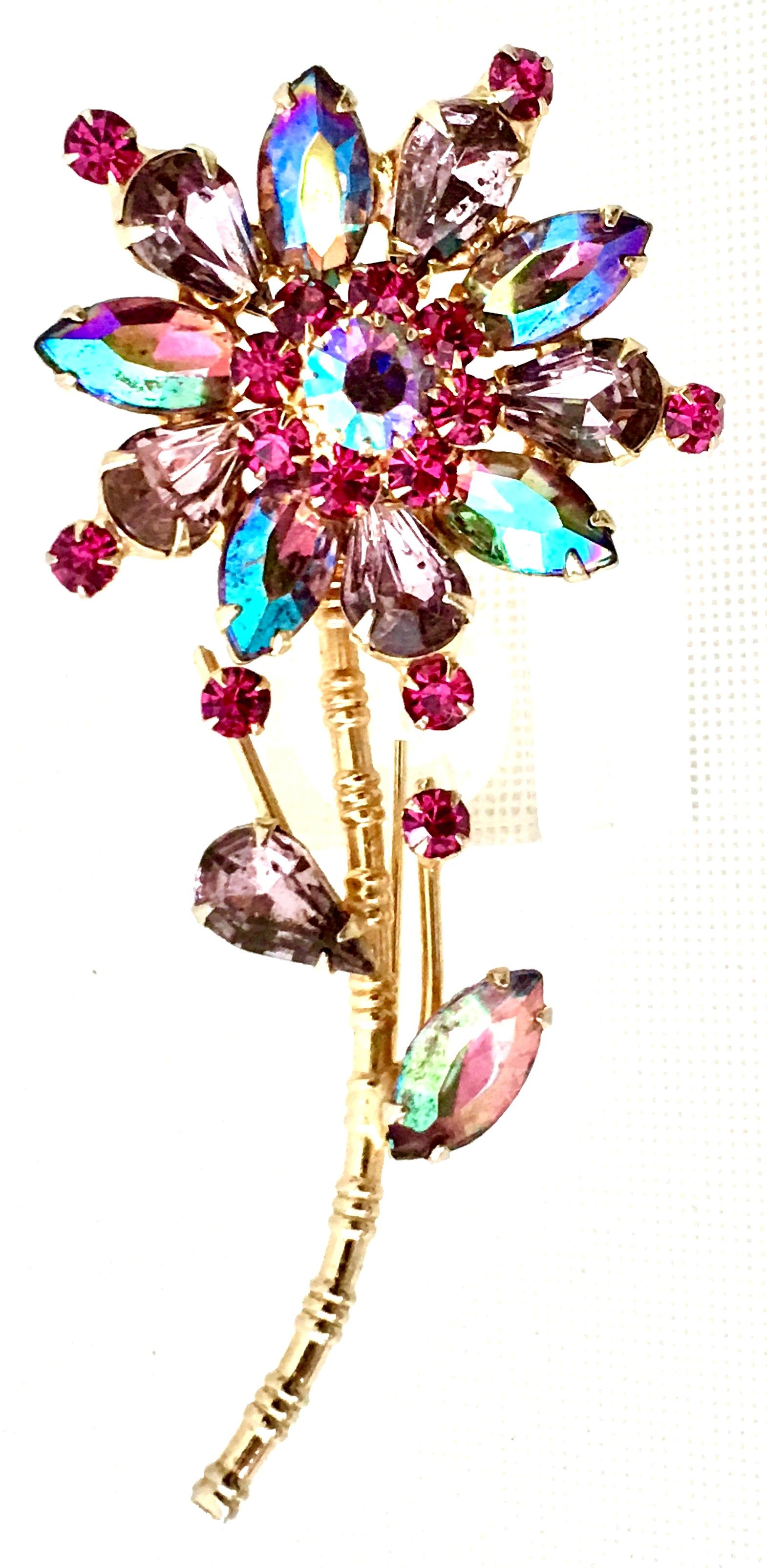 Mid-20th Century Organic Modern  gold plate flower brooch. Features gold plate faux bois long stem with brilliant cut and faceted pink ruby, amethyst and aurora borealis fancy prong set Austrian crystal rhinestones.