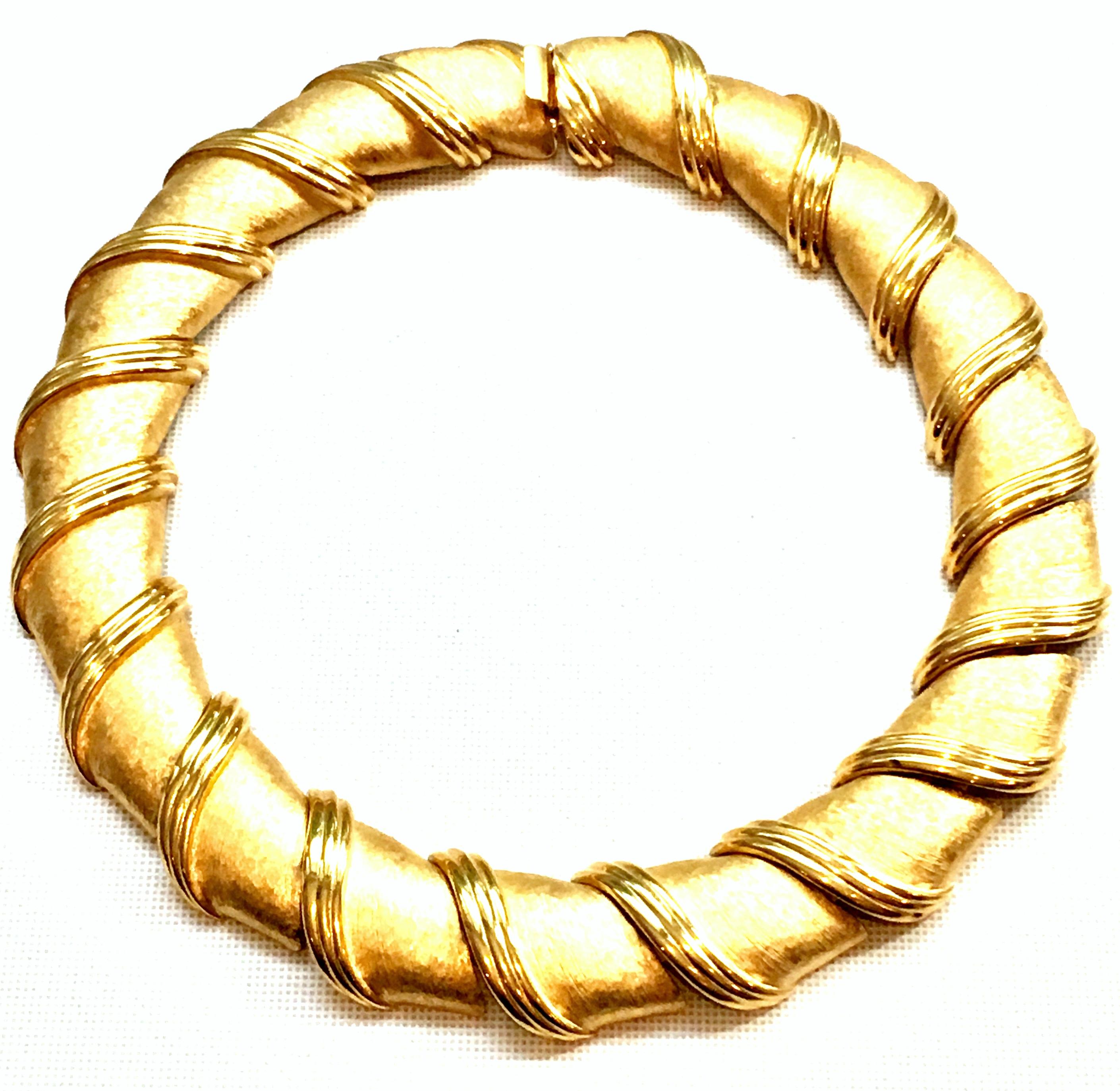 20th Century Gold Plate Curved Link Choker Necklace By, Kiam. Features chunky and substantial finely crafted brushed gold plate curved link with applied polished gold plate detail. Signed on the underside, Ellen Kiam. Each link is approximately,