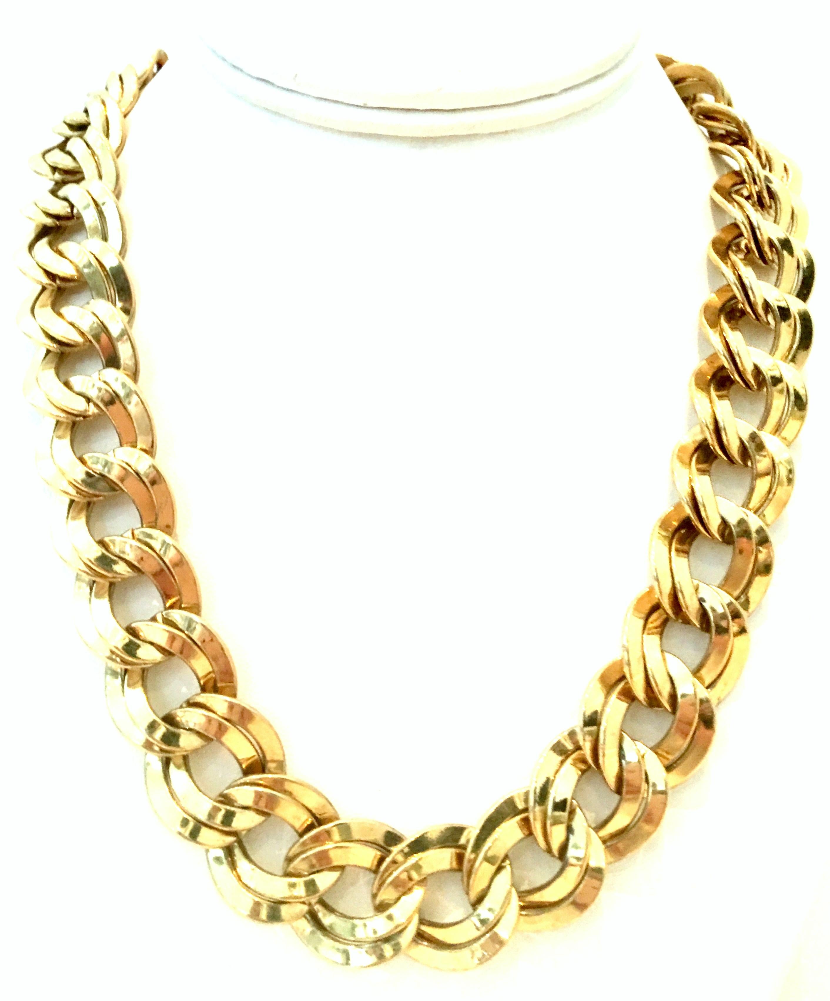 20th Century Gold Plate Double Chain Link Necklace By, Monet.
Features a gold plate double chain link design, with adjustable hook style clasp.
Signed on the clasp, Monet.